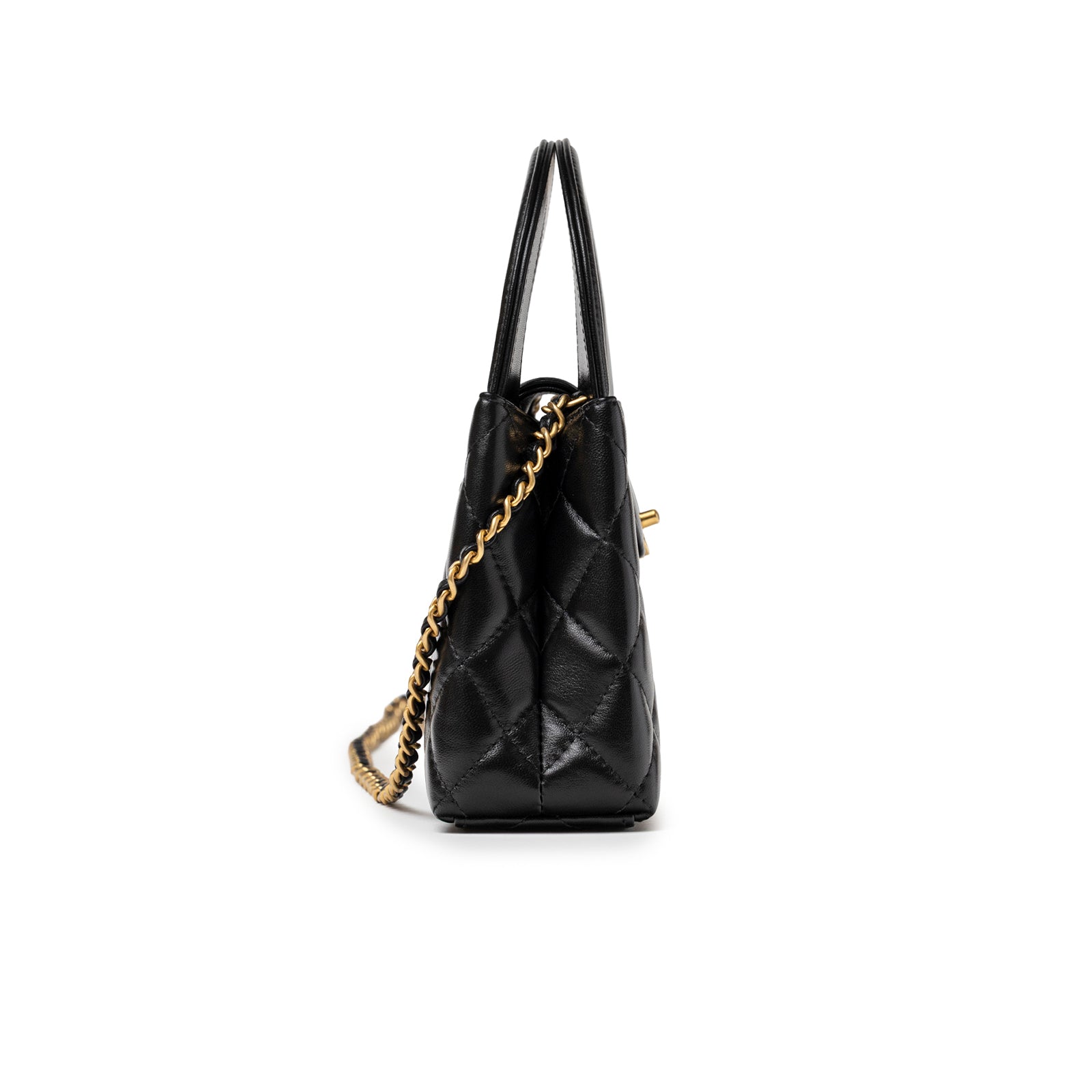 Side angle of Chanel Kelly Shopper Small Black Shiny Aged Calfskin Brushed Gold Hardware with chain strap detail