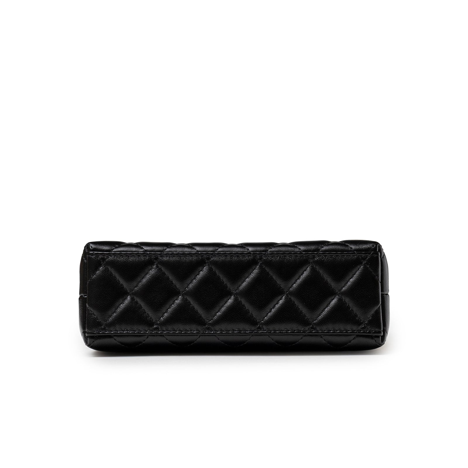 Bottom view of Chanel Kelly Shopper Small Black Shiny Aged Calfskin Brushed Gold Hardware with quilted leather pattern