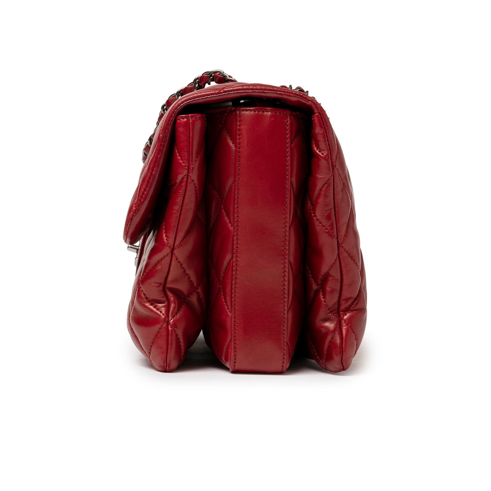 Side view of Chanel Maxi 3 Accordion Flap Bag Lambskin Red Palladium Hardware showing quilted leather compartments