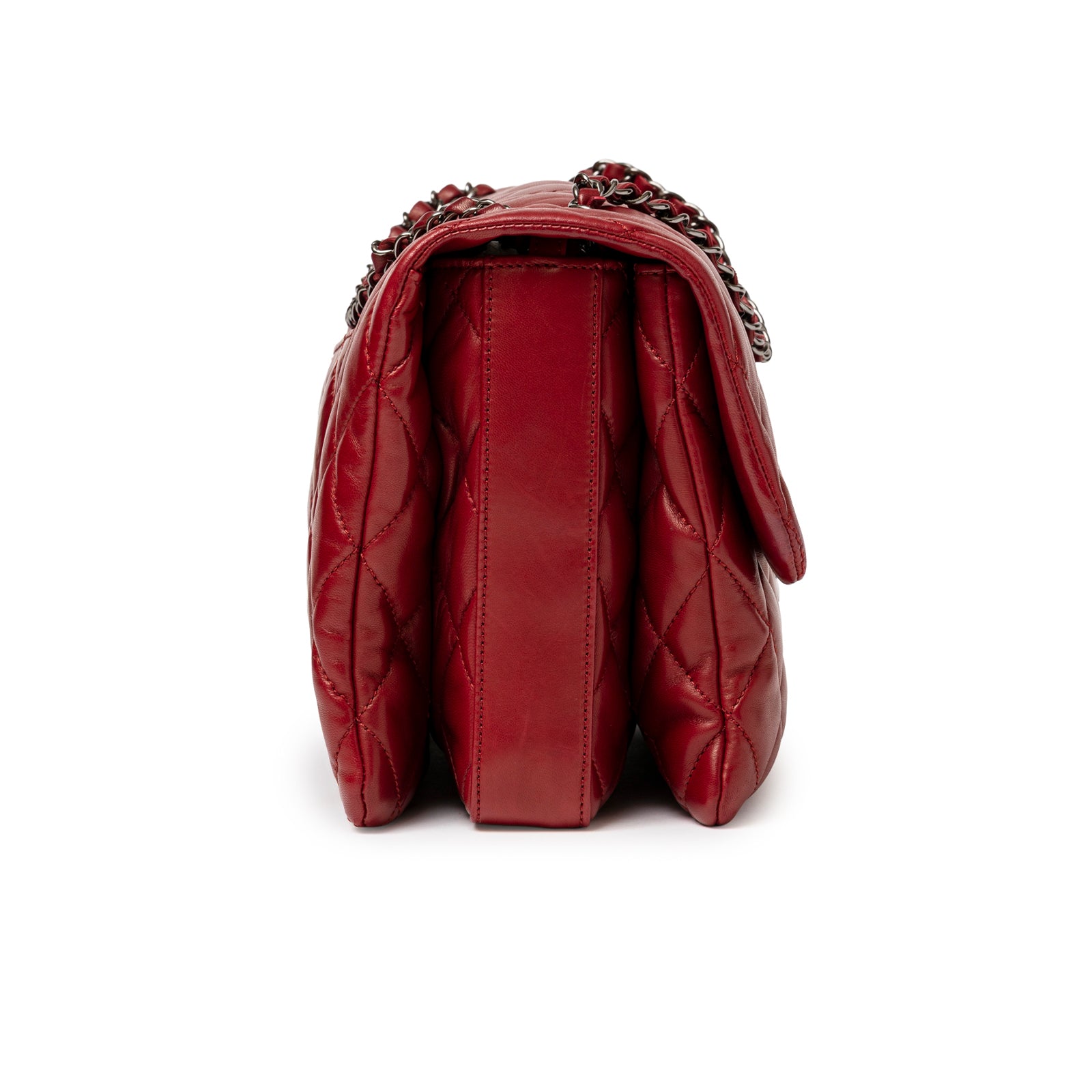Side view of Chanel Maxi 3 Accordion Flap Bag Lambskin Red Palladium Hardware showing quilted leather folds and chain strap detail