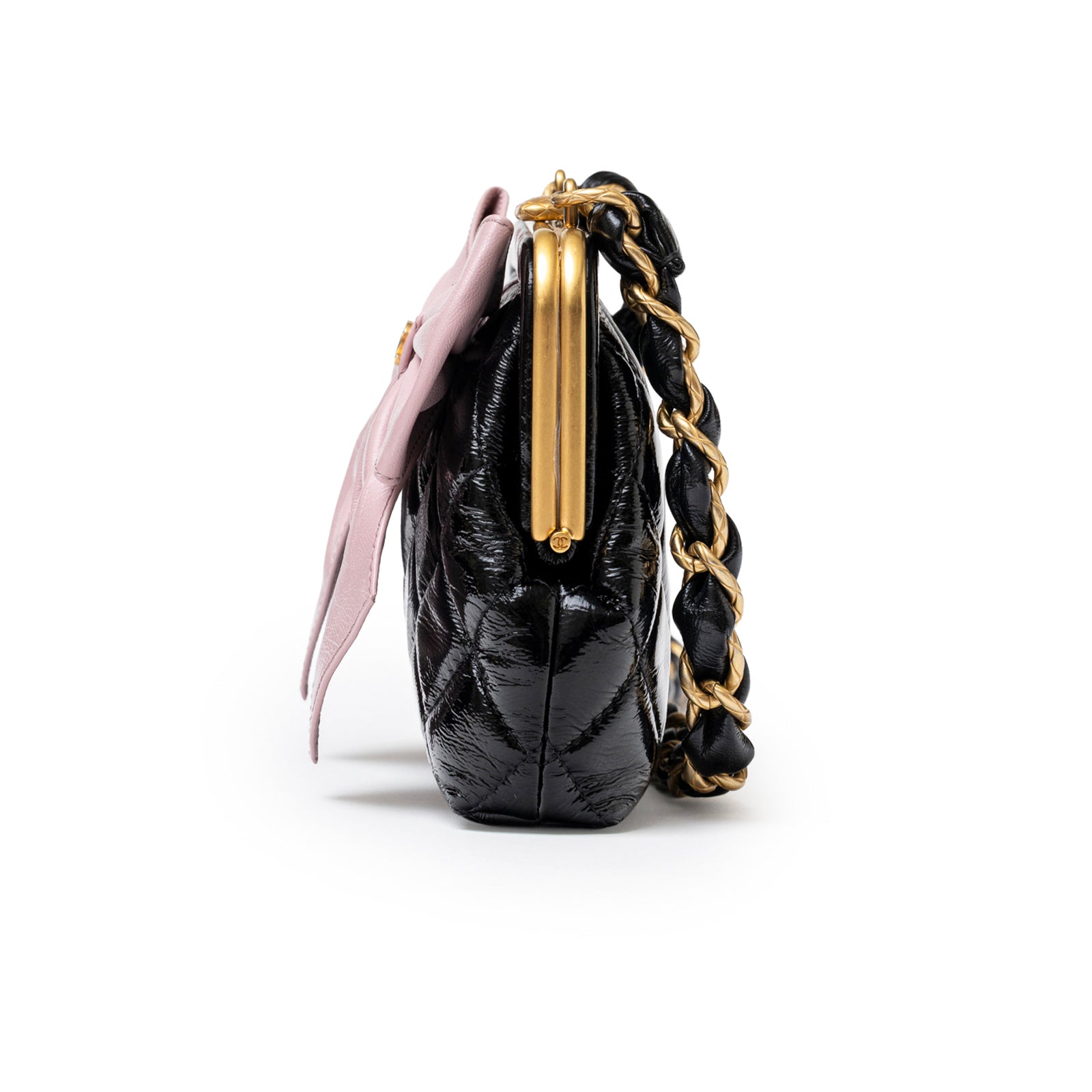 Side view of Chanel Maxi Bow Clutch With Chain Black/Pink Shiny Quilted Patent Crumpled/Lambskin Brushed Gold Hardware showing chain detail