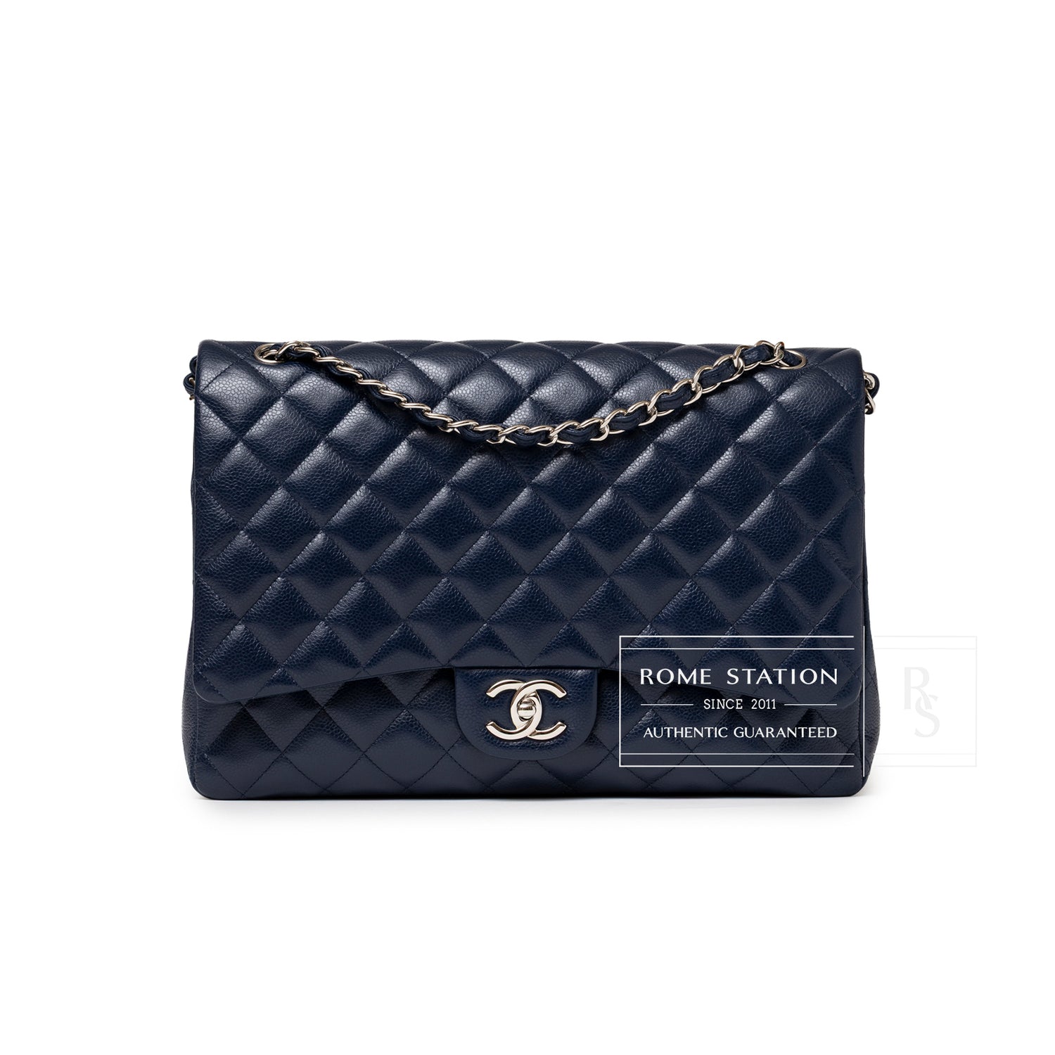Front view of Chanel Maxi Classic Double Flap Caviar Navy Palladium Hardware showing quilted leather and chain strap details