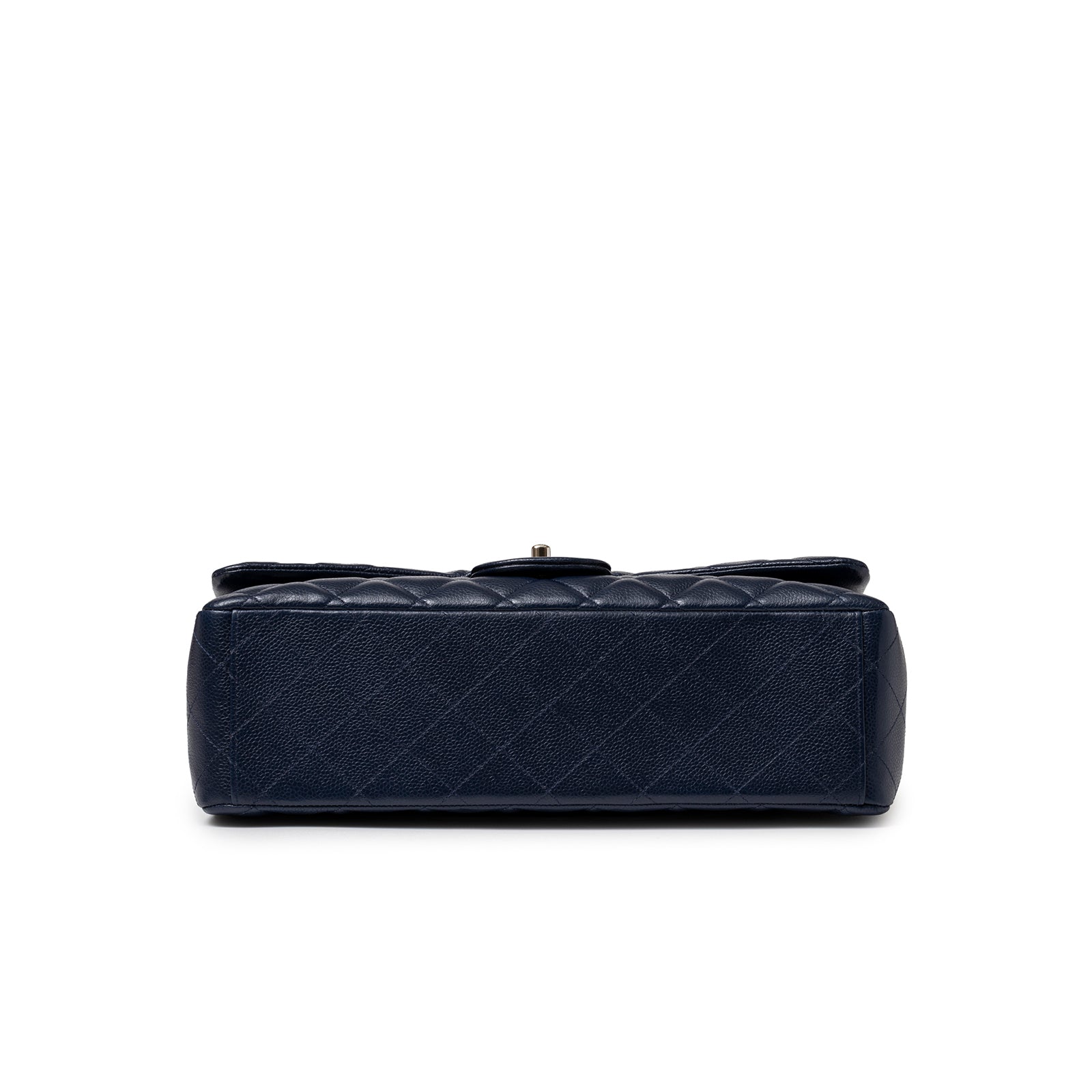 Bottom view of Chanel Maxi Classic Double Flap Caviar Navy Palladium Hardware showing textured leather base