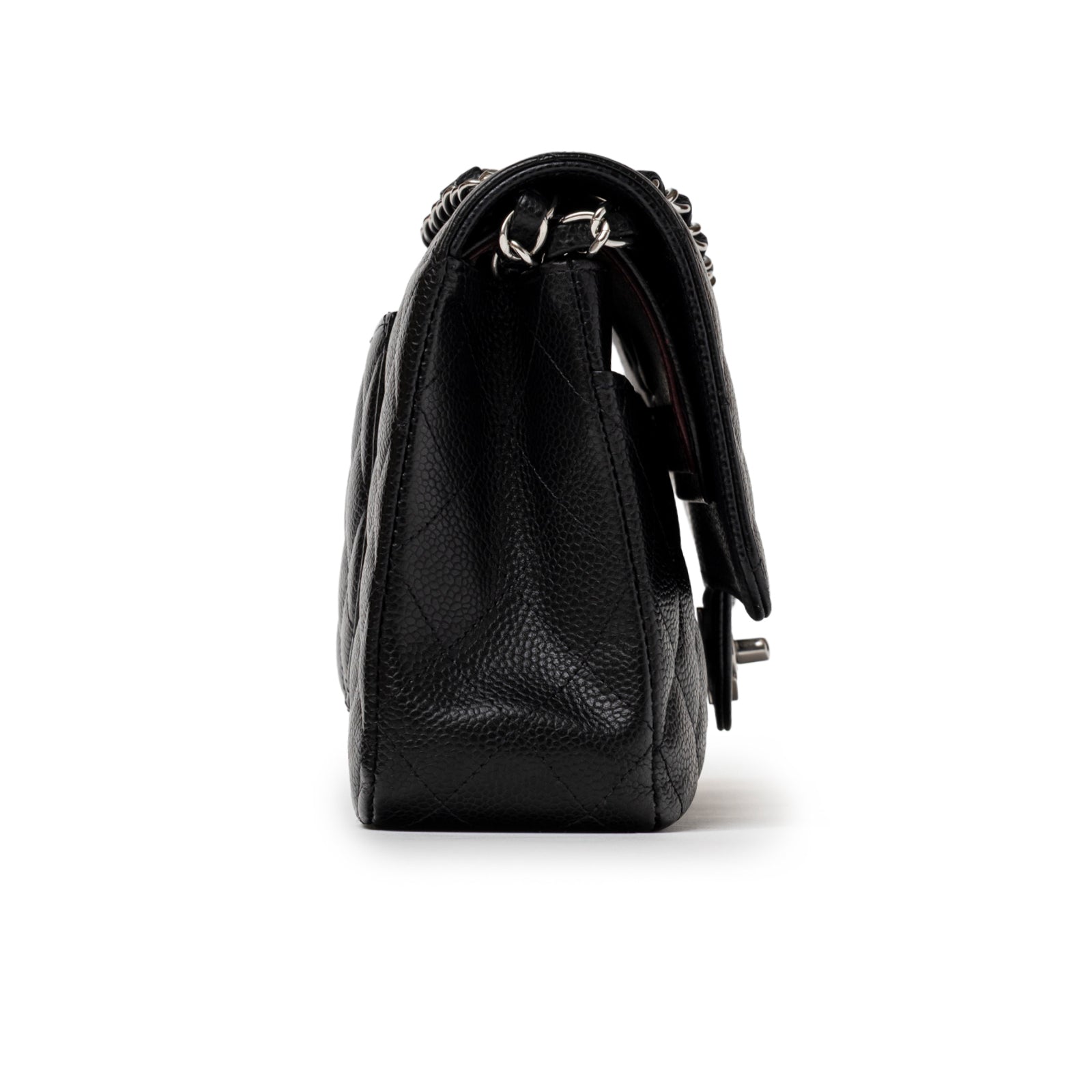 Side profile of Chanel Medium Classic Flap Bag Black Caviar Palladium Hardware showing textured leather and flap edge