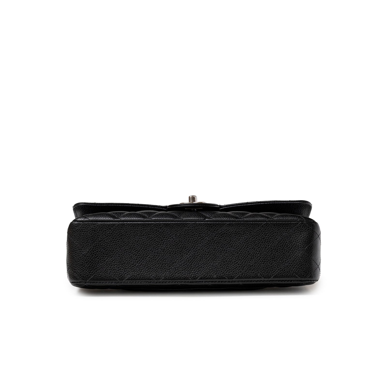 Bottom view of Chanel Medium Classic Flap Bag Black Caviar Palladium Hardware showing textured leather base