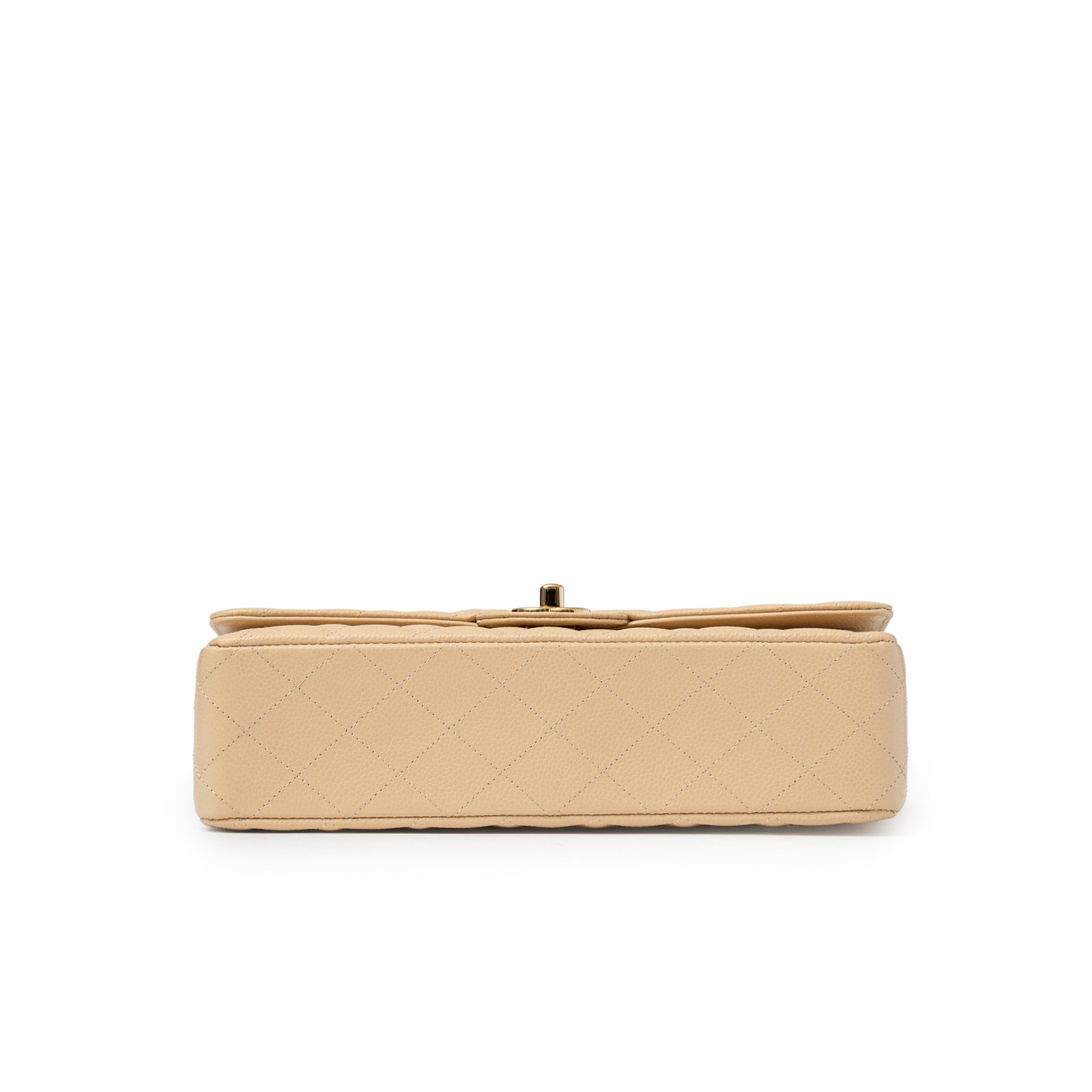Bottom view of Chanel Classic Flap Medium Caviar Beige Gold Hardware showing quilted leather base