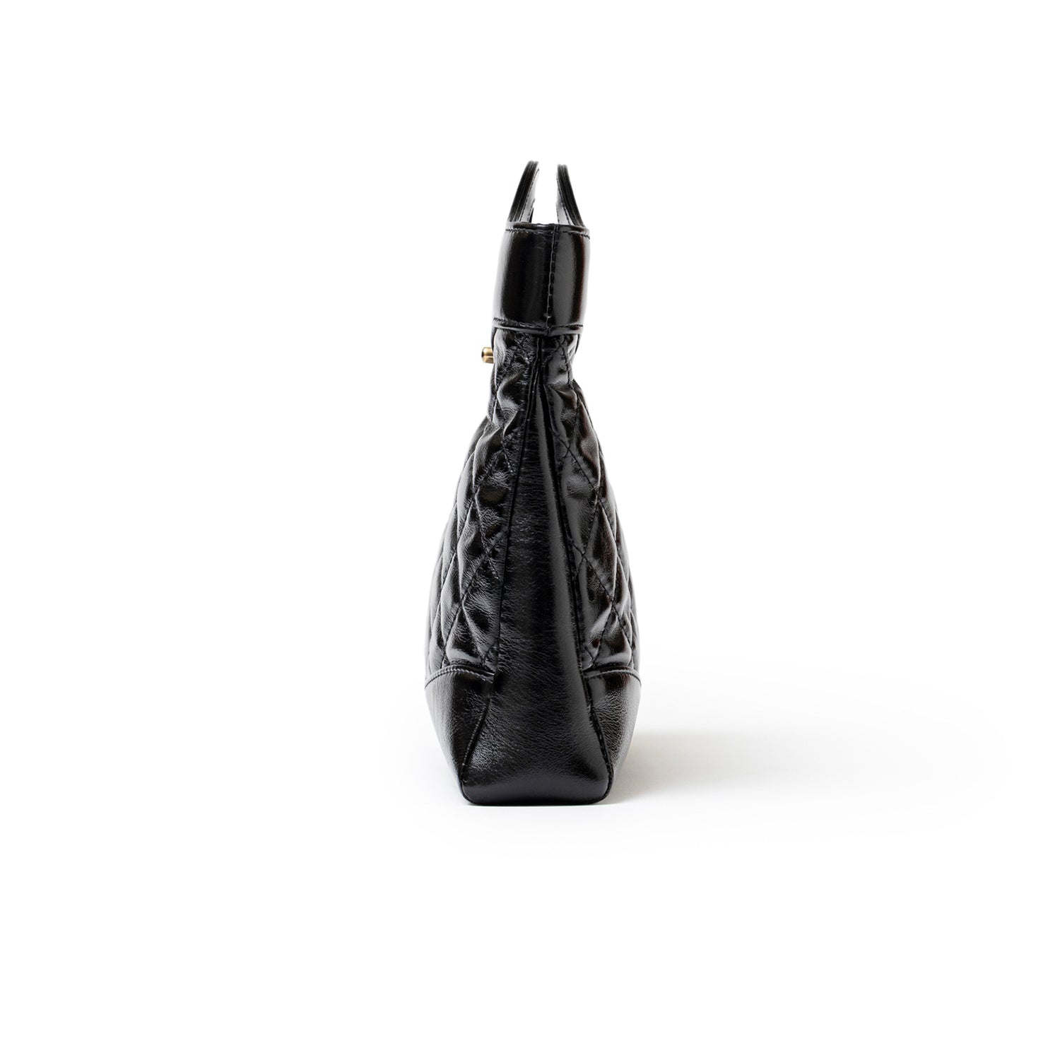 Side profile of Chanel Mini 31 Shopping Tote Calfskin Black Gold Hardware showing sleek quilted texture
