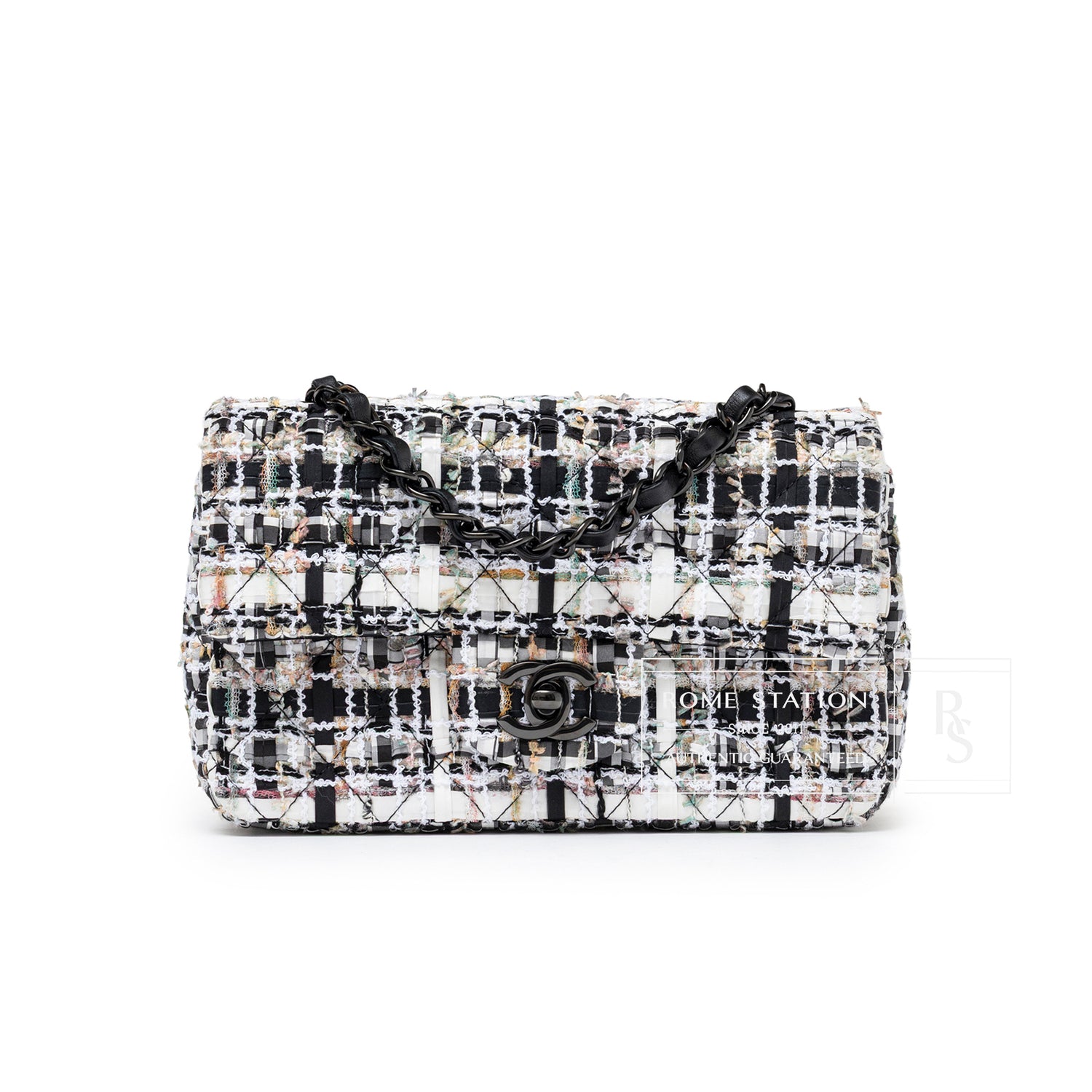 Front view of Chanel Mini Classic Flap Black and White Tweed Black Hardware with chain strap and logo clasp