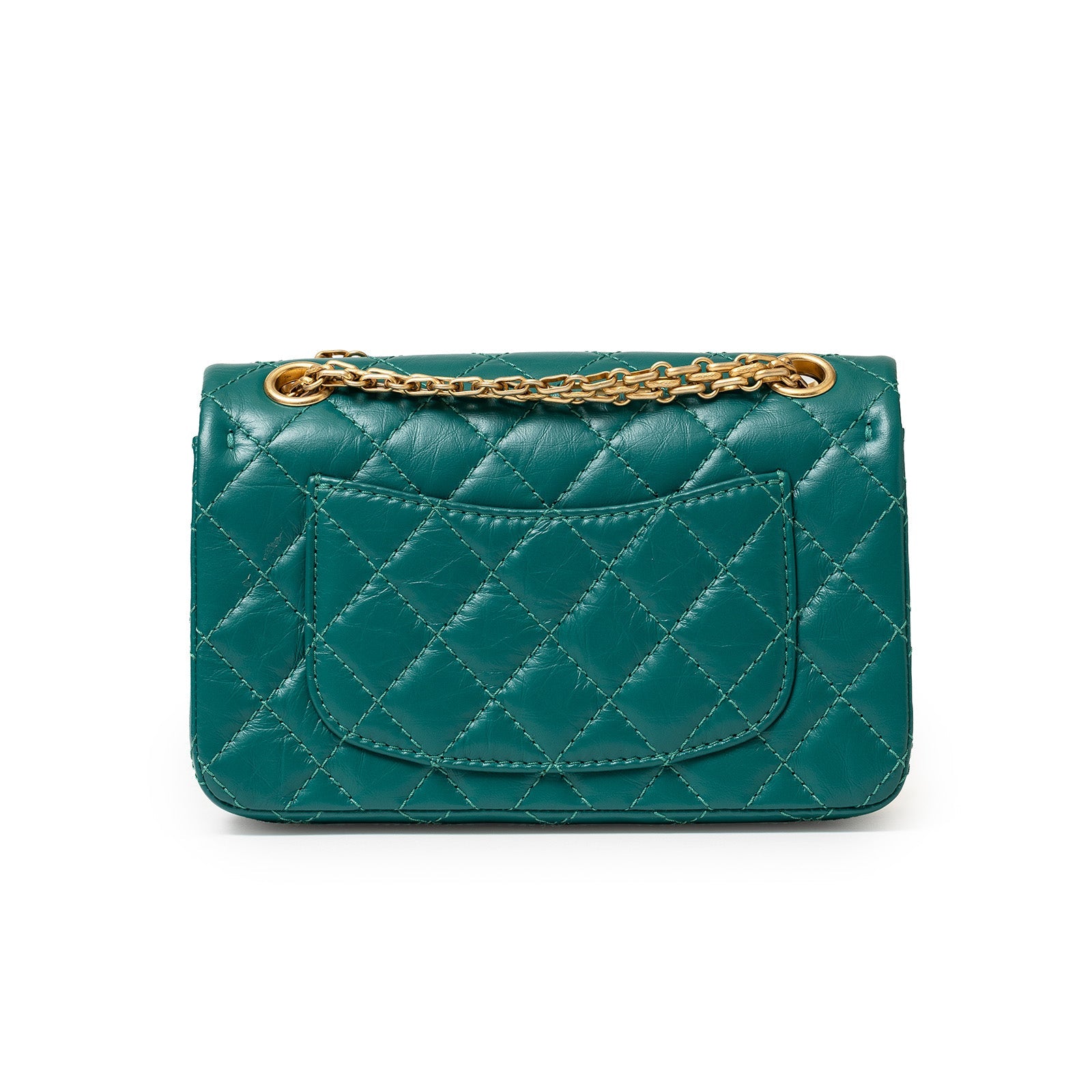 Back view of Chanel Mini Reissue 2.55 Flap Bag Green Calf Brushed Gold Hardware showing quilted leather and chain strap slot