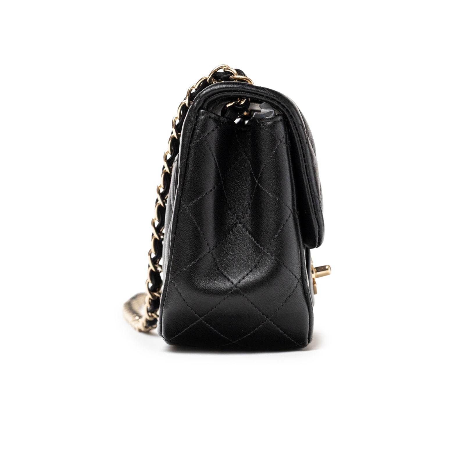 Side angle of Chanel Mini Square Classic Flap bag Black Lambskin Light Gold Hardware showing quilted lambskin texture and chain strap detail