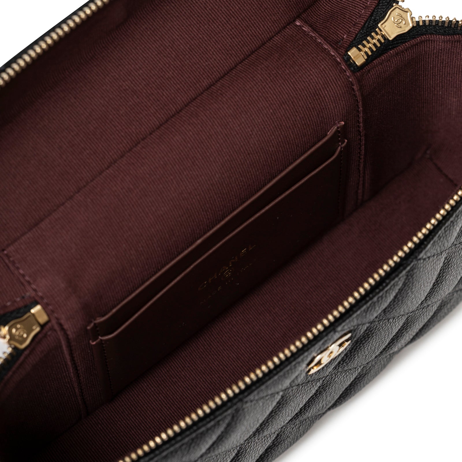 Interior view of Chanel Top Handle Vanity with Chain Black Caviar Light Gold Hardware showing burgundy fabric lining and card slots