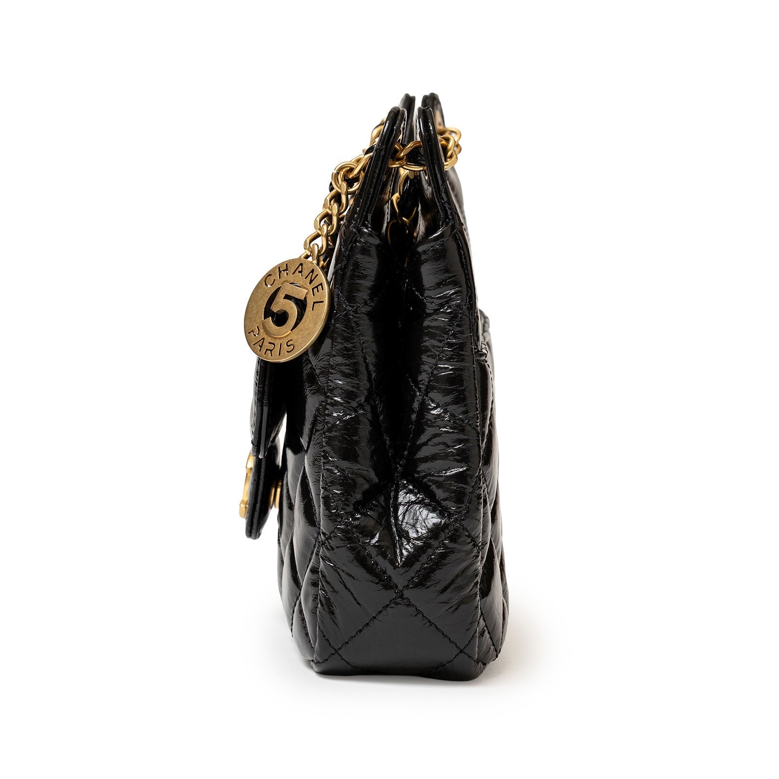 Side view of Chanel Wavy CC Hobo Small Shiny Quilted Calf Gold Hardware showing quilted glossy leather and chain detail