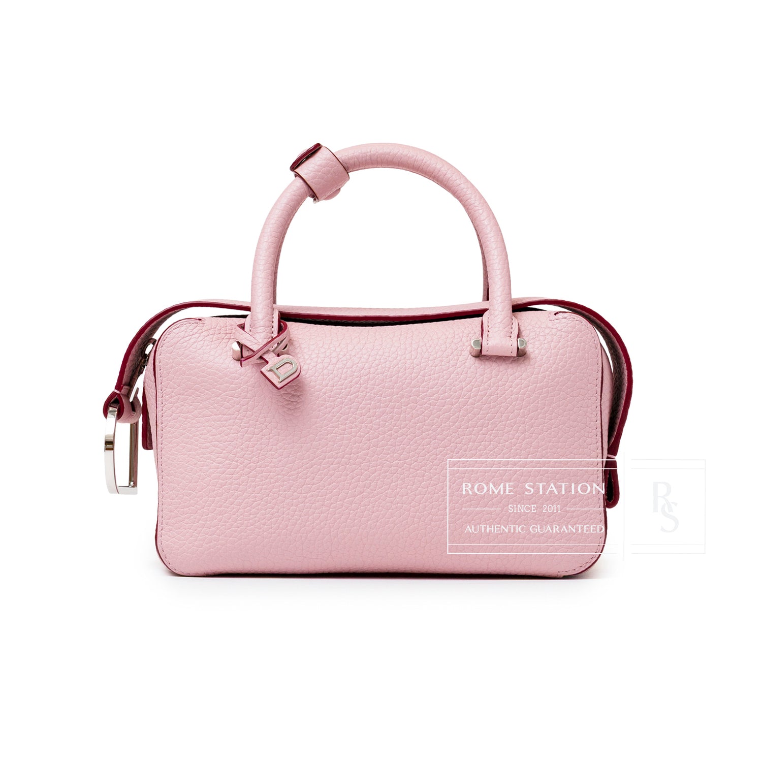 Front view of Delvaux Cool Box Mini Taurillon Soft Blush Palladium Hardware showing soft pink textured leather and rounded handles