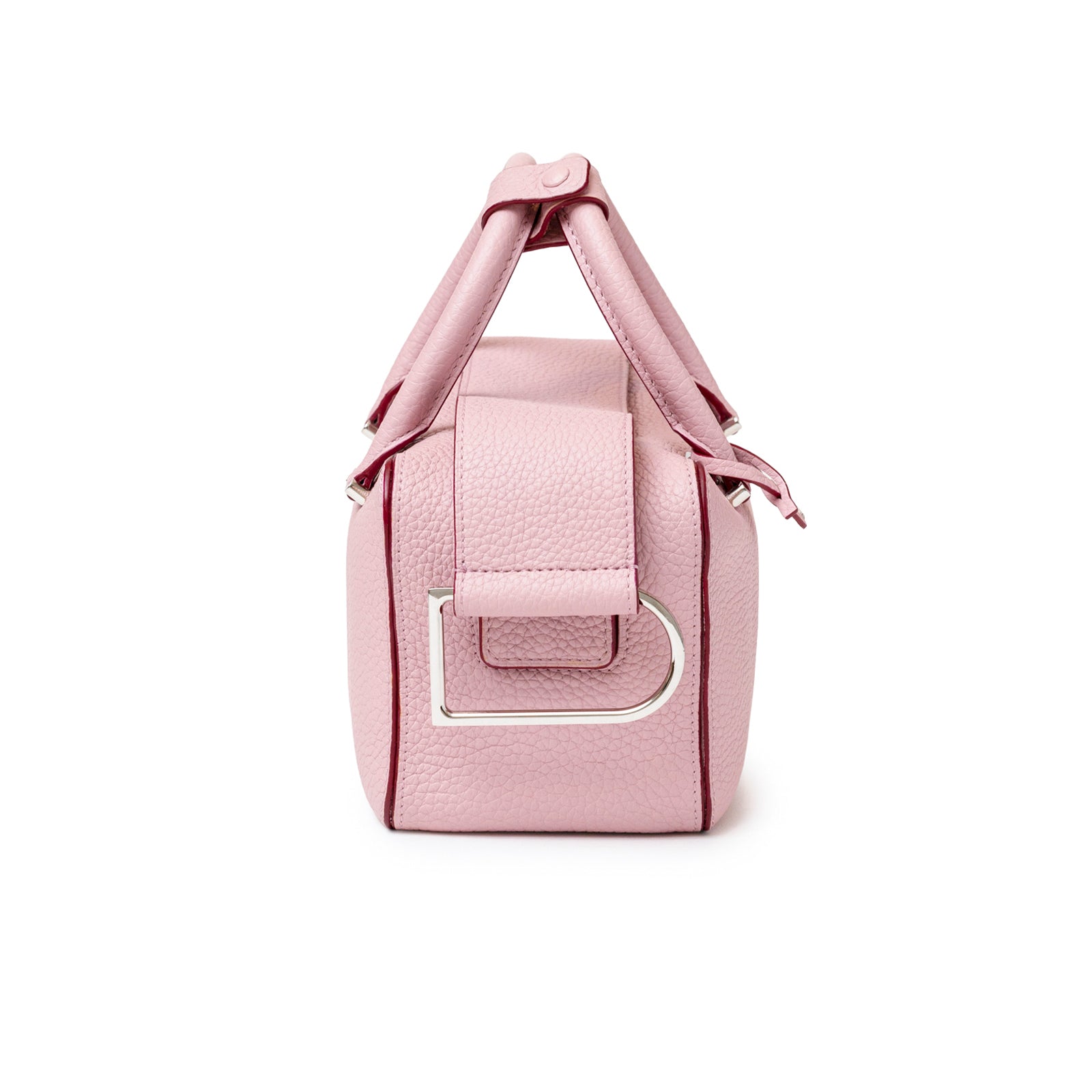 Side view of Delvaux Cool Box Mini Taurillon Soft Blush Palladium Hardware showing textured leather and metal detail