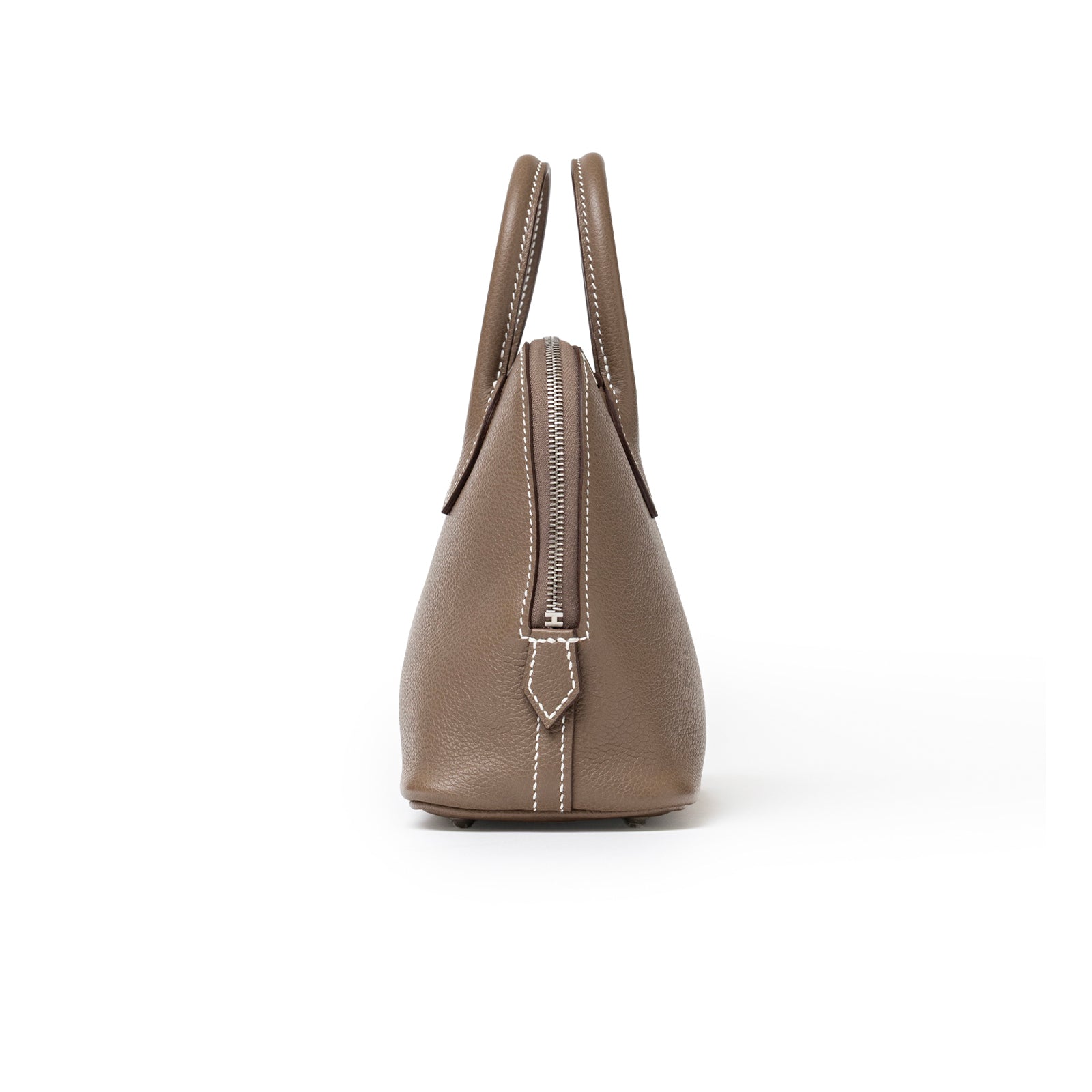 Side view of Hermès 1923 Bolide Mini Etoupe Evercolor Palladium Hardware showing zipper and stitching details