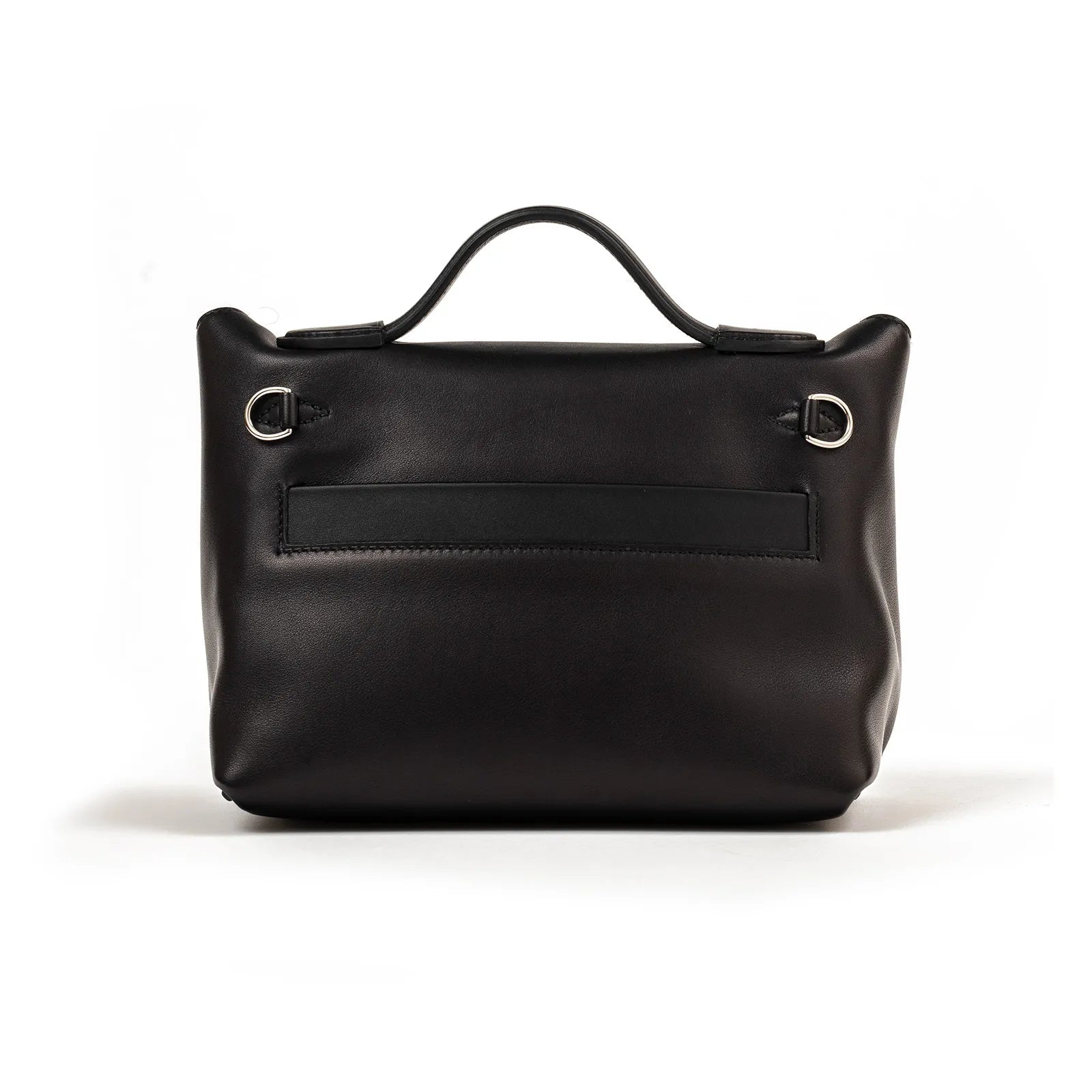 Back view of black leather Hermès 24/24 21 handbag with palladium hardware and top handle detail