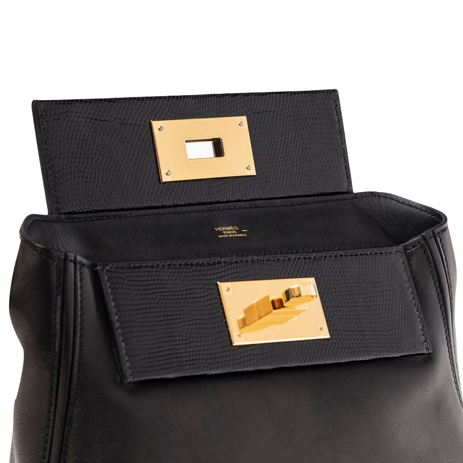 Open flap close-up showing black lizard texture and gold hardware on Hermès 24/24 21 Touch Black Lizard Volupto Gold Hardware