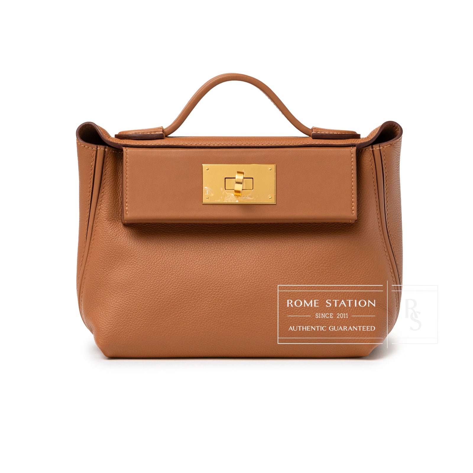 Front view of Hermès 24/24 21 Gold Evercolor Swift Gold Hardware handbag with top handle and gold clasp