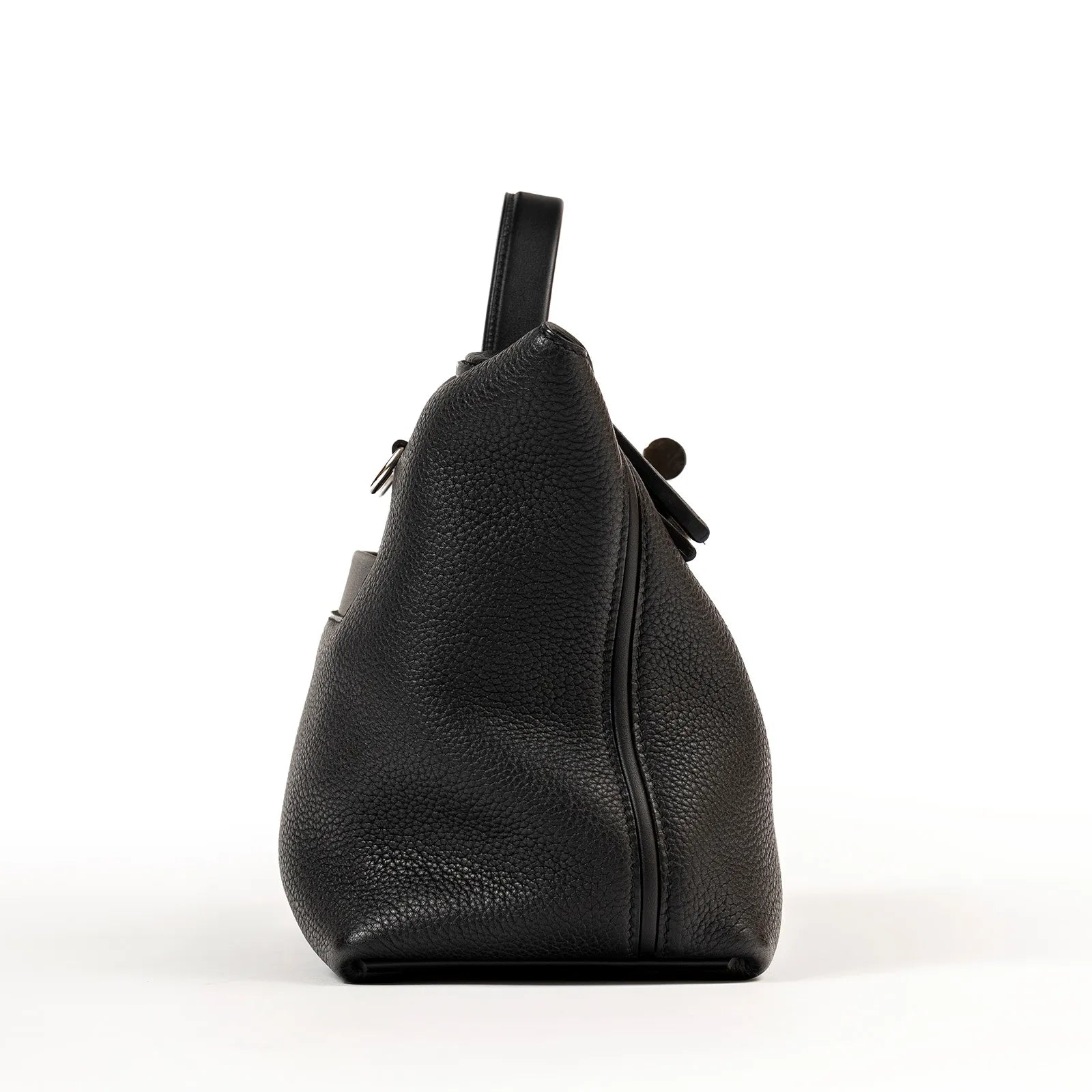 Side view of black Taurillon Maurice leather Hermès 24/24 29 Sac bag with palladium hardware