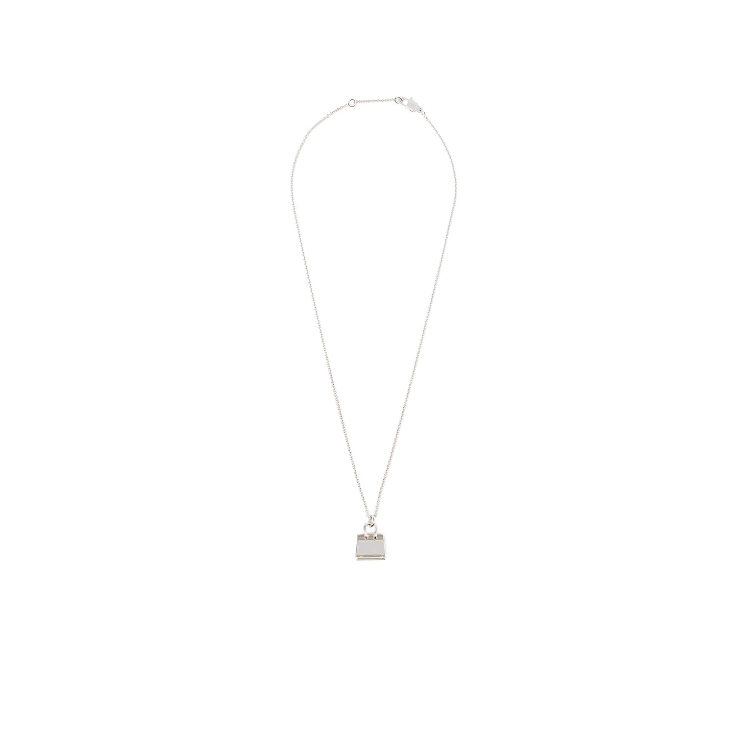 Top-down view of Hermès Amulettes Birkin Pendant Diamonds and 18k White Gold with thin chain and lock-shaped motif