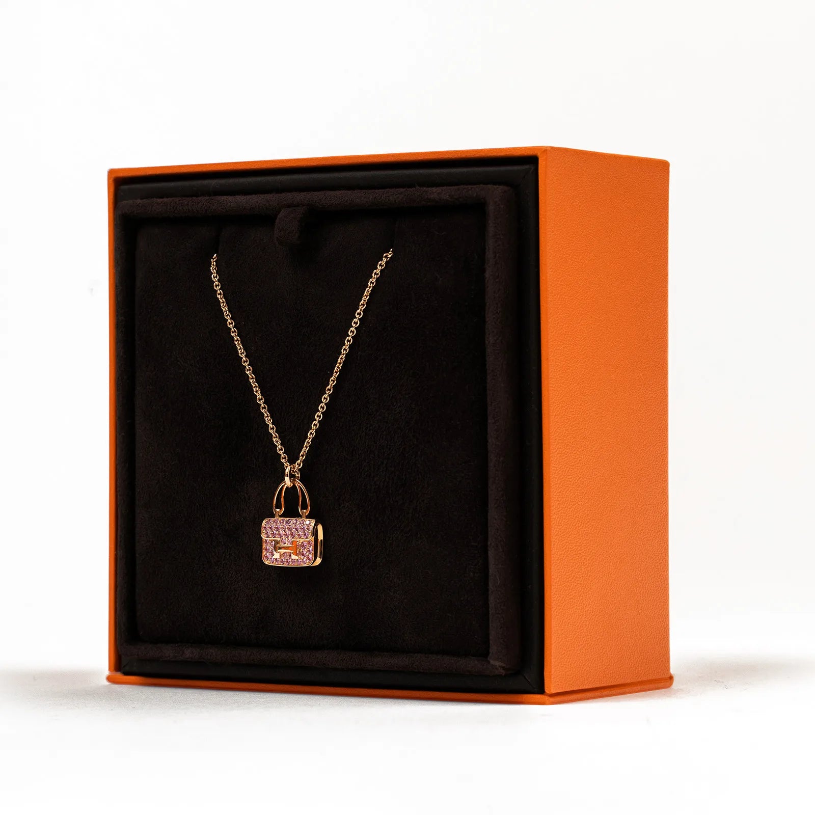Hermès Amulettes Constance Pendant 18K Rose Gold and Pink Saphhire