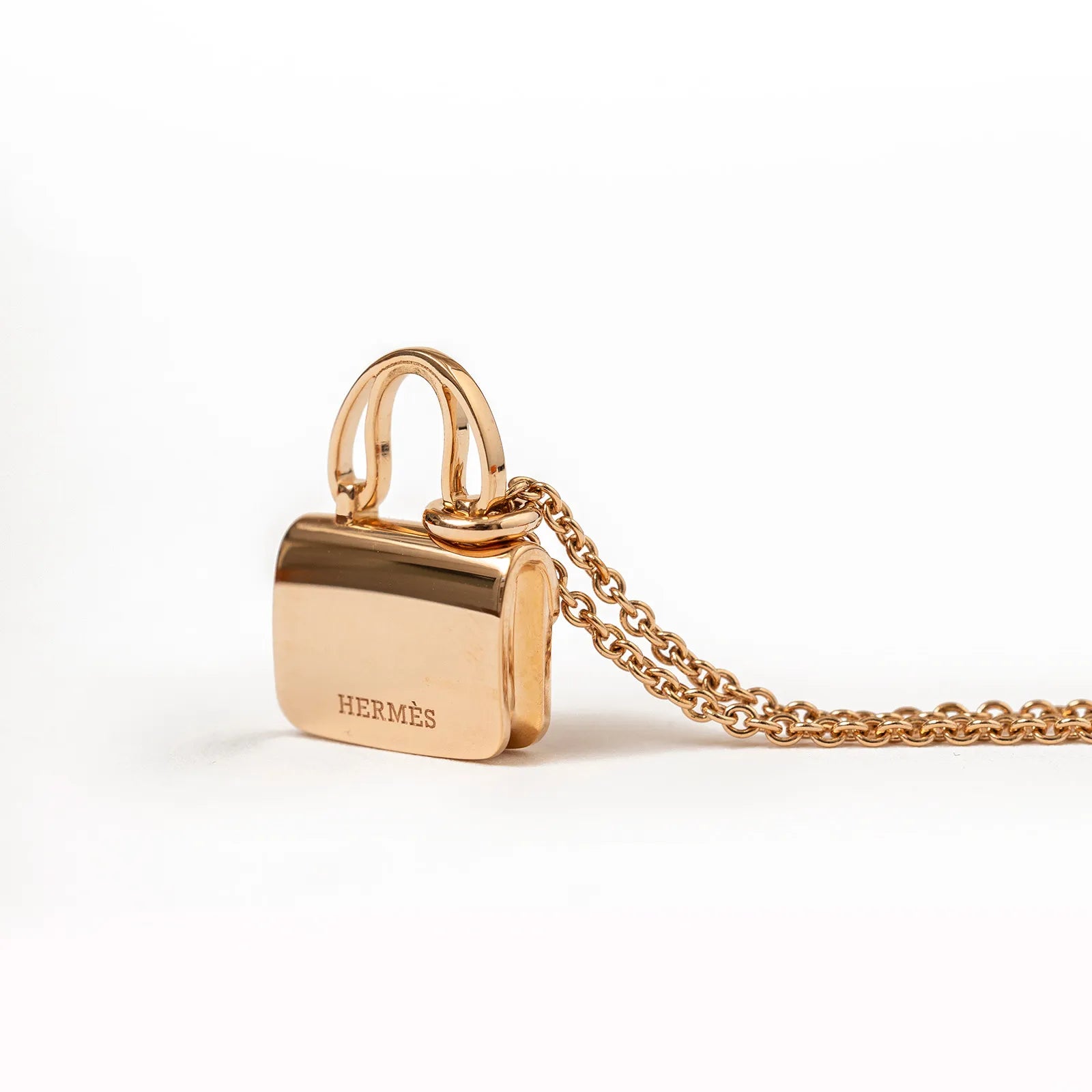 Hermès Amulettes Constance Pendant 18K Rose Gold and Pink Saphhire
