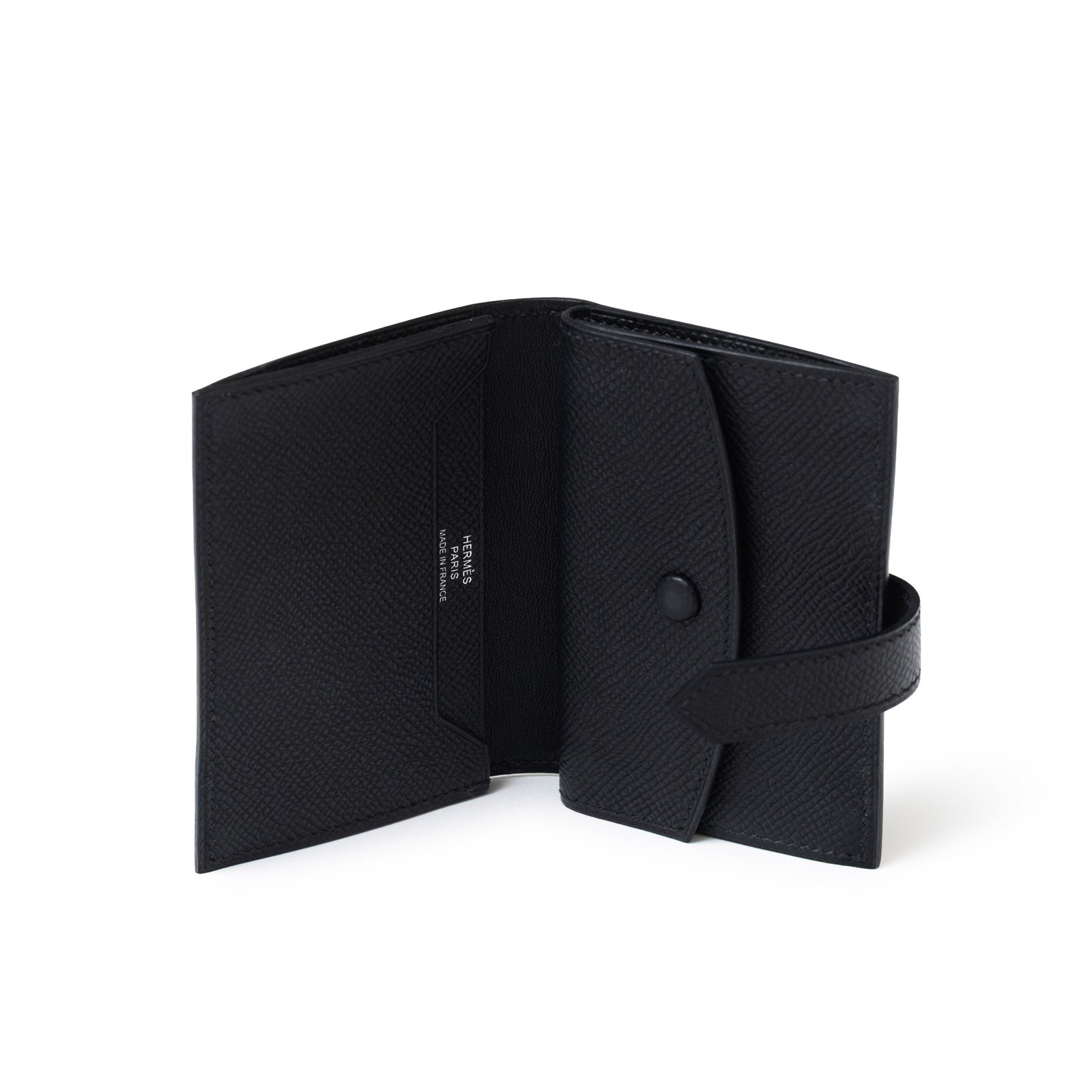 Open angled view of Hermès Bearn Mini Wallet Black Epsom Palladium Hardware showing interior compartments and clasp detail