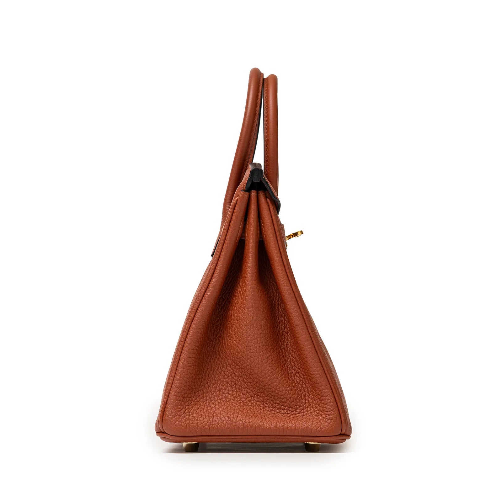 Side profile of Hermès Birkin 25 in copper Togo leather with gold tone hardware and rolled leather handles