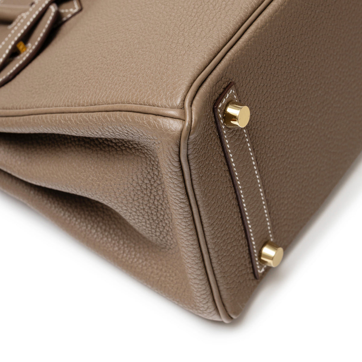 Hermès Birkin 25 Etoupe Togo Gold Hardware close-up of corner and protective feet