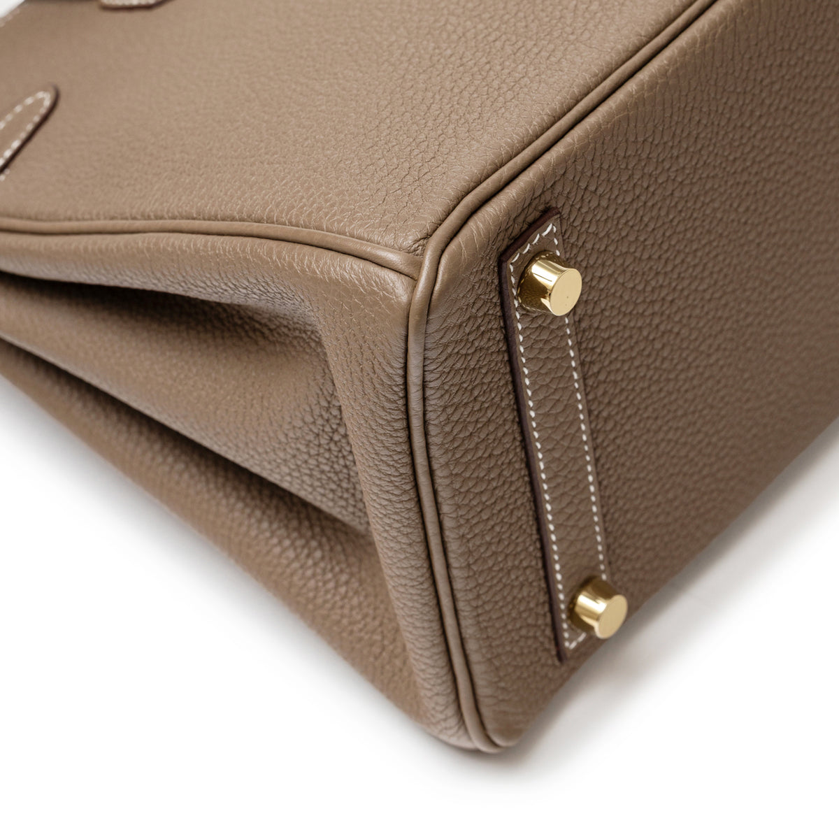 Hermès Birkin 25 Etoupe Togo Gold Hardware corner close-up with protective feet and stitching