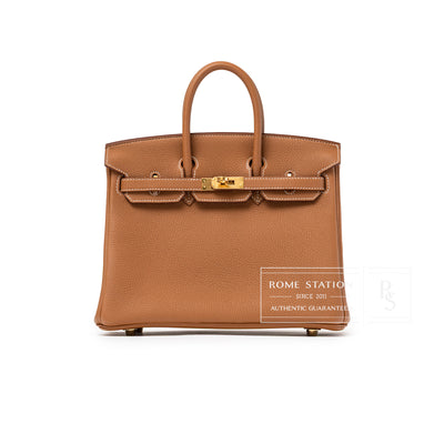 Front view of Hermès Birkin 25 Gold Togo Gold Hardware handbag in warm brown textured leather with gold clasp detail