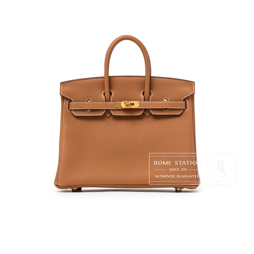 Front view of Hermès Birkin 25 Gold Togo Gold Hardware handbag in warm brown textured leather with gold clasp detail