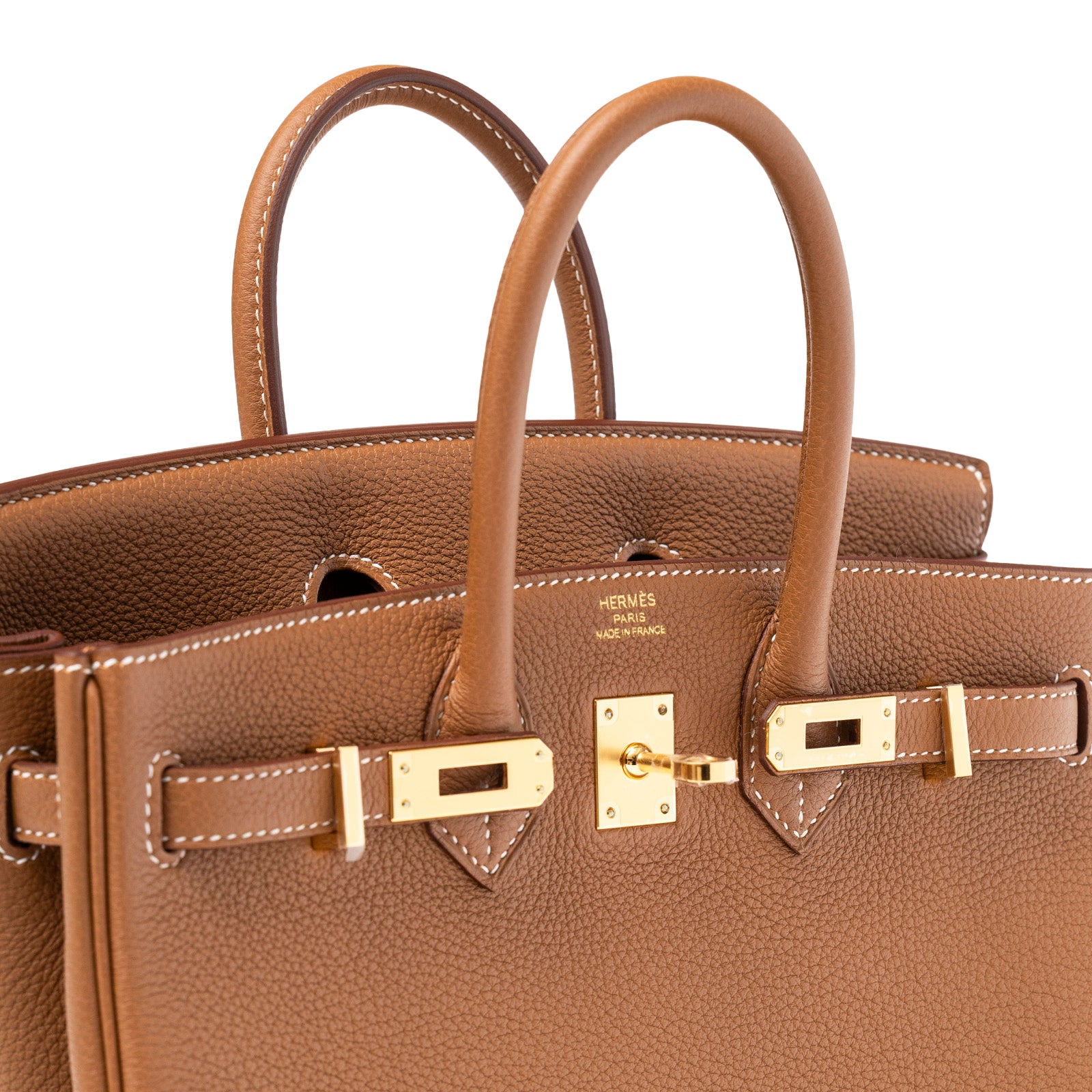 Close-up of Hermès Birkin 25 Gold Togo Gold Hardware showing gold clasp and textured leather handles