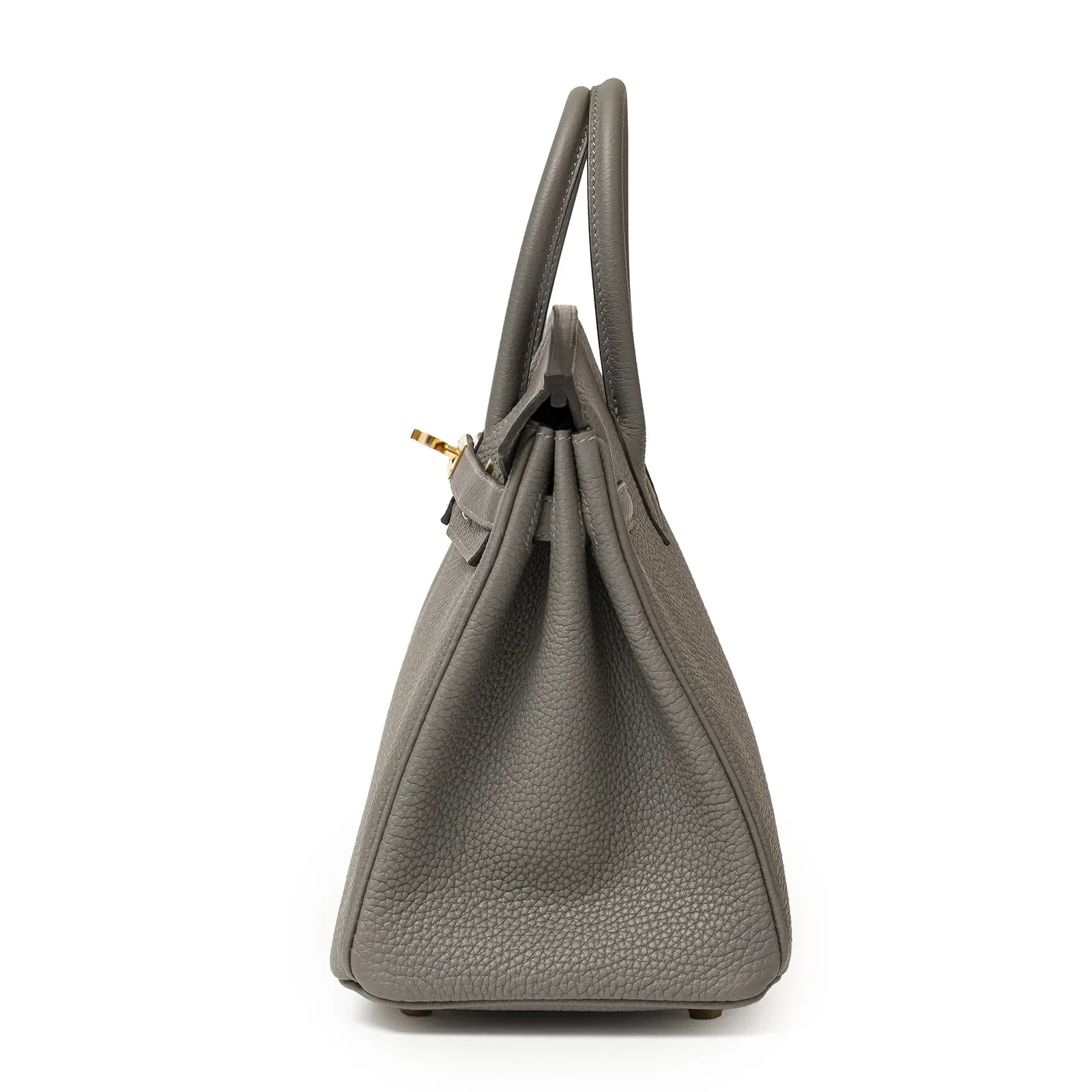 Side profile of a Gris Meyer textured leather handbag with gold hardware and rolled handles