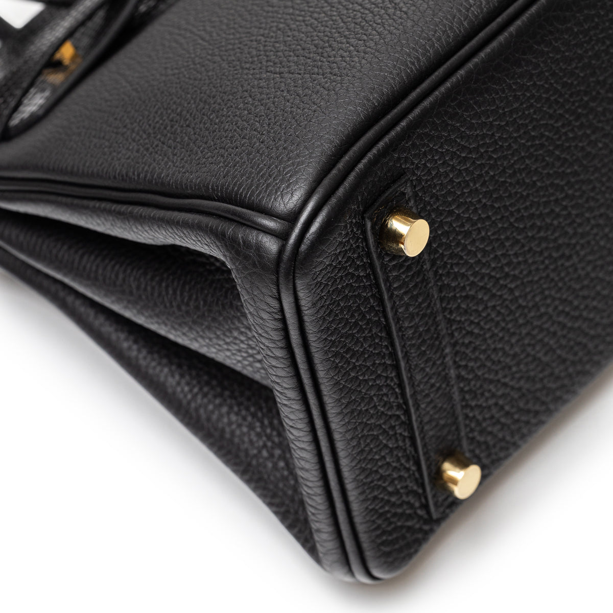 Hermès Birkin 25 Touch Black Togo Lizard Gold Hardware corner close up with gold feet