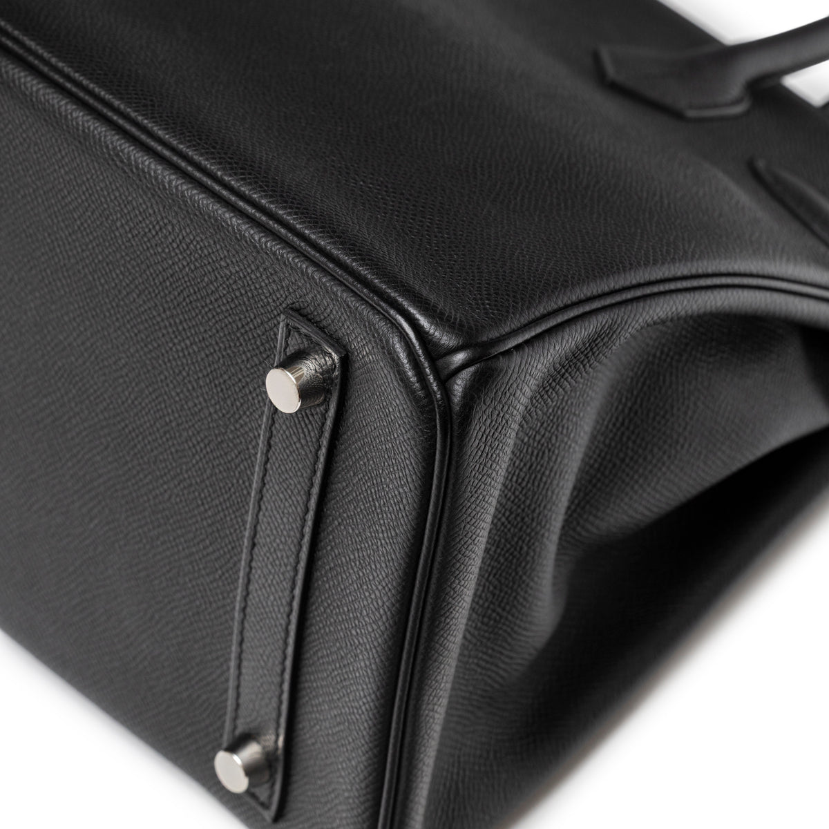 Close-up corner of Hermès Birkin 30 Black Epsom Palladium Hardware showing 