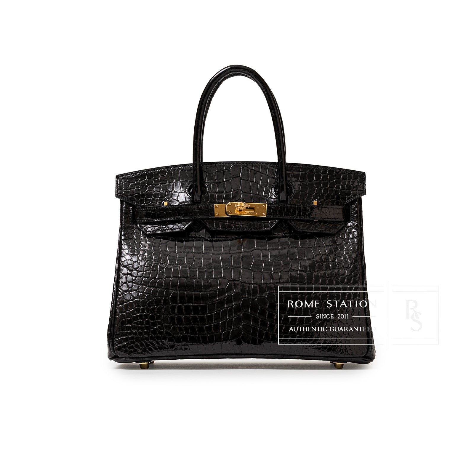 Front view of Hermès Birkin 30 Black Shiny Porosus Crocodile with gold hardware and structured handles.