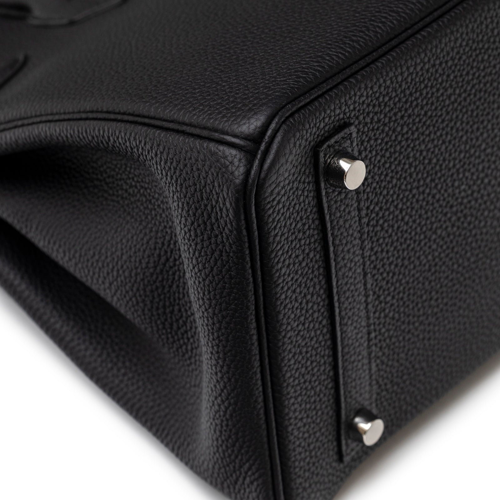 Close-up of the base corner and palladium feet on Hermès Birkin 30 Black Togo Palladium Hardware handbag