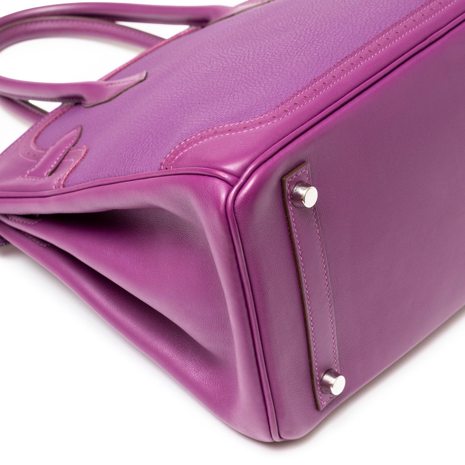 Close-up of Hermès Birkin 30 Ghillies Anemone Togo Swift Palladium Hardware corner showing leather texture and hardware feet