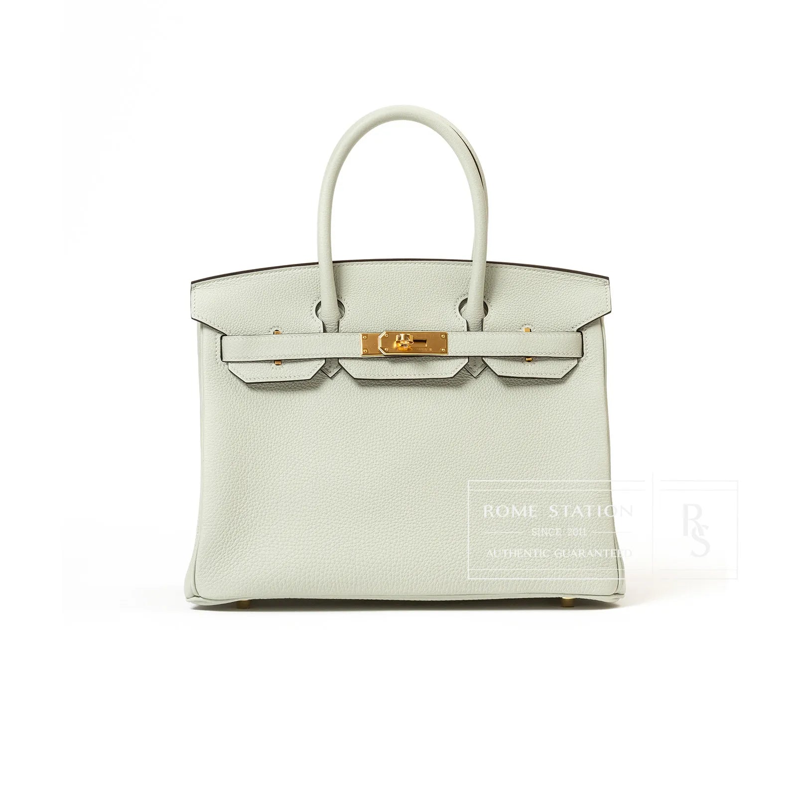 Front view of Hermès Birkin 30 in Gris Neve Togo leather featuring gold hardware and structured handles