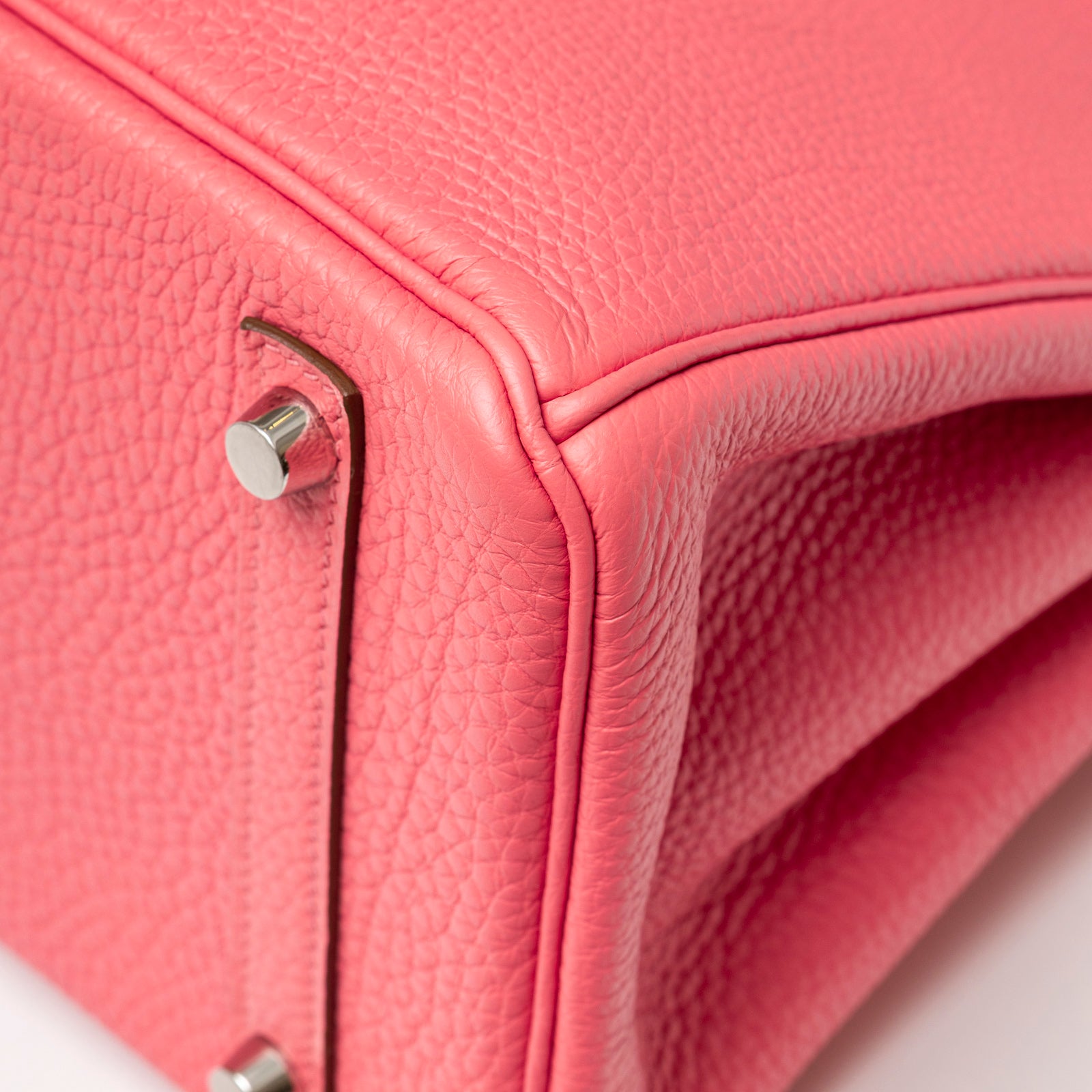 Close-up of bottom corner and palladium feet on Hermès Birkin 30 Rose Lipstick Togo Palladium Hardware bag