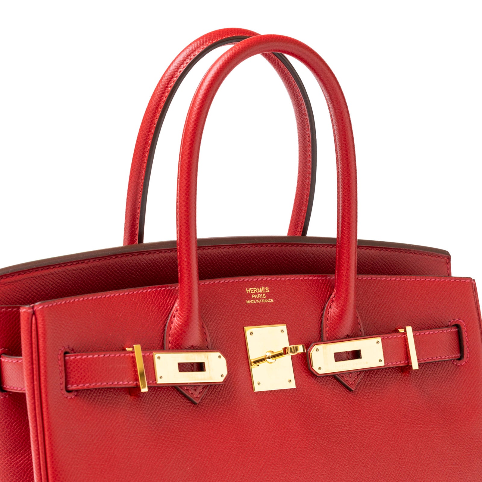 Close-up front view of Hermès Birkin 30 Rouge Casaque Epsom Gold Hardware with polished gold clasp details