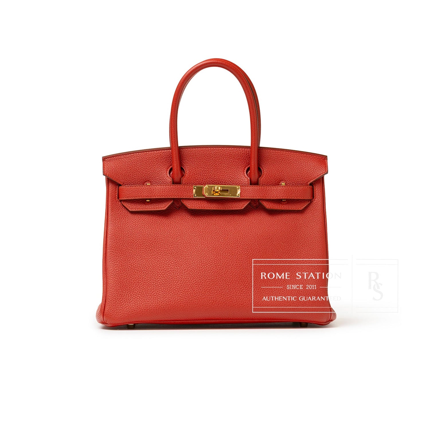 Front view of Hermès Birkin 30 Rouge Togo leather handbag with gold hardware and rolled handles.