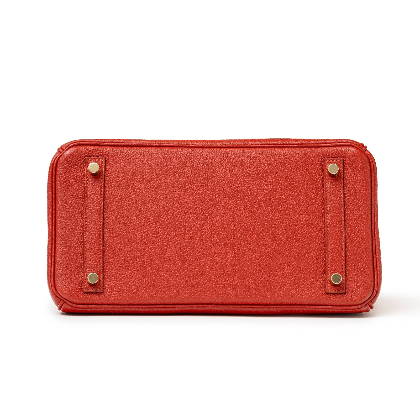 Bottom view of Hermès Birkin 30 Rouge Togo Gold Hardware showing base and protective feet details.