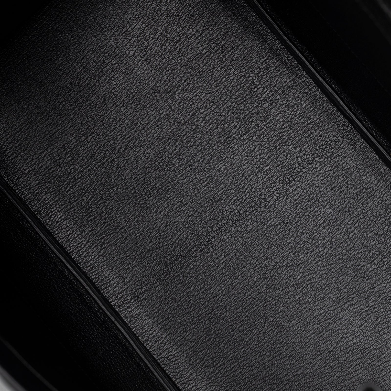 Interior view of Hermès Birkin 35 Black Togo Gold Hardware showing smooth black leather base lining details