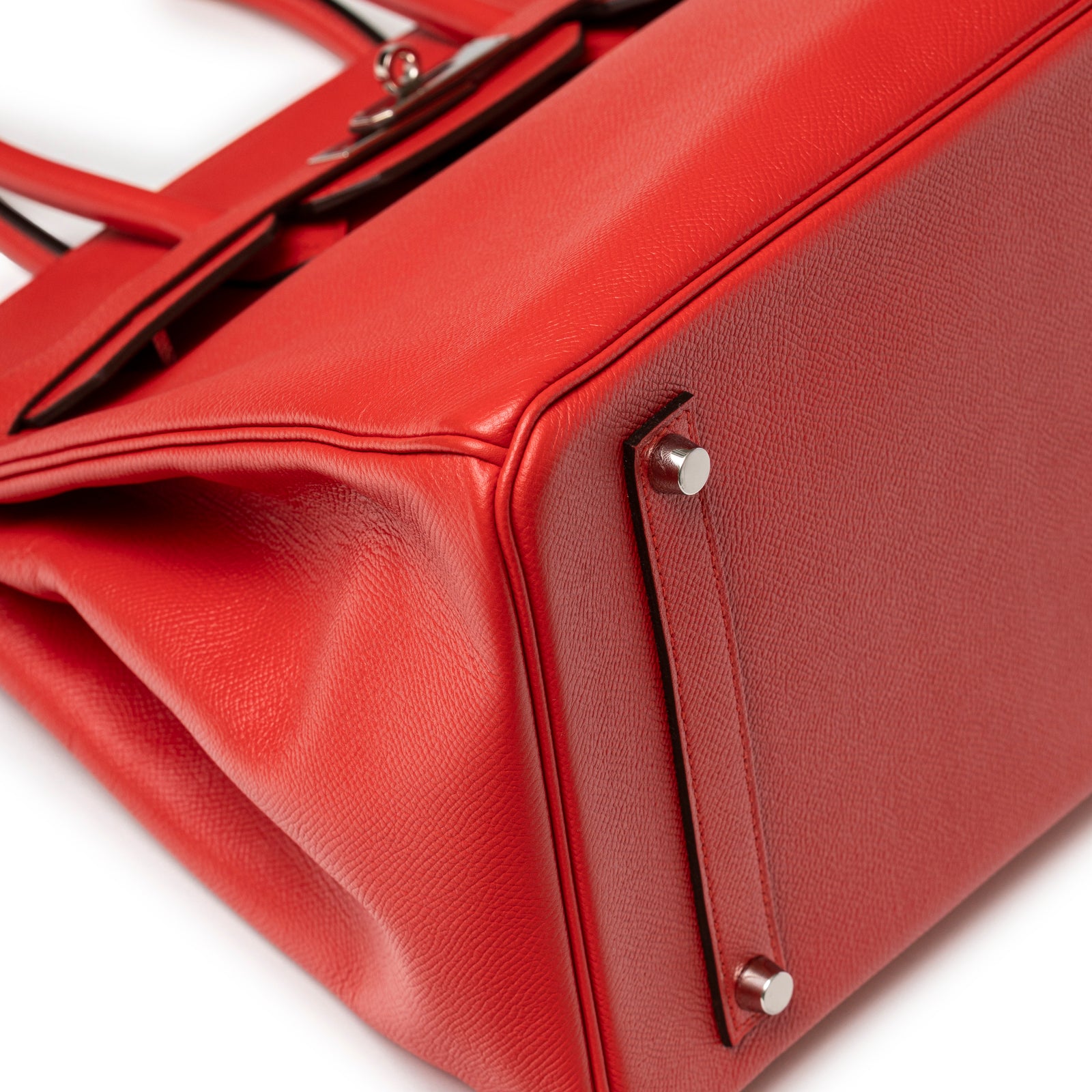 Close-up of base corner and metal studs on Hermès Birkin 35 Bougainvillea Epsom Palladium Hardware handbag
