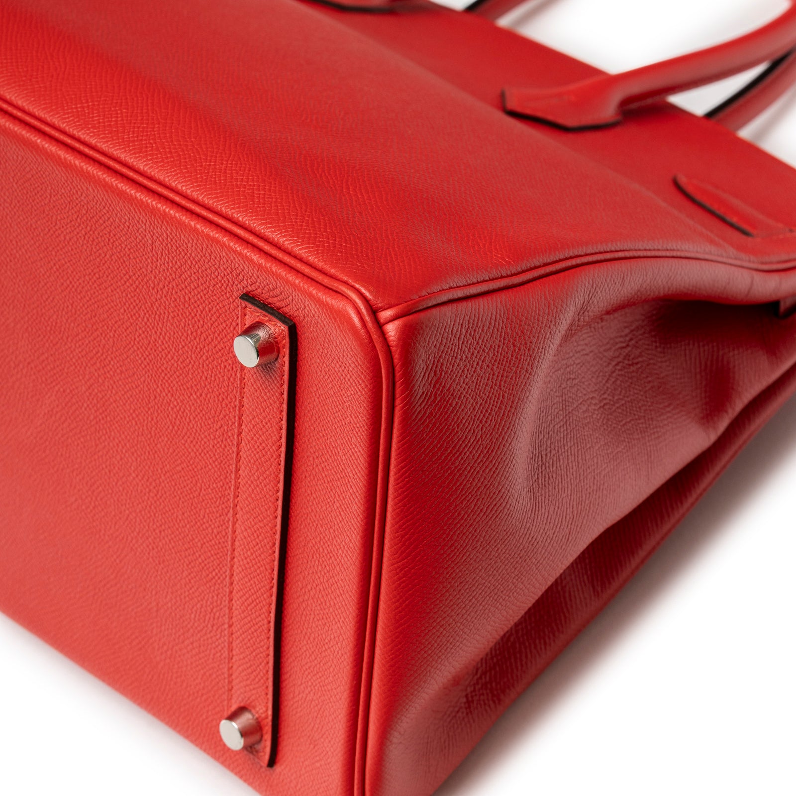 Close-up of base corner and palladium feet on Hermès Birkin 35 Bougainvillea Epsom Palladium Hardware handbag
