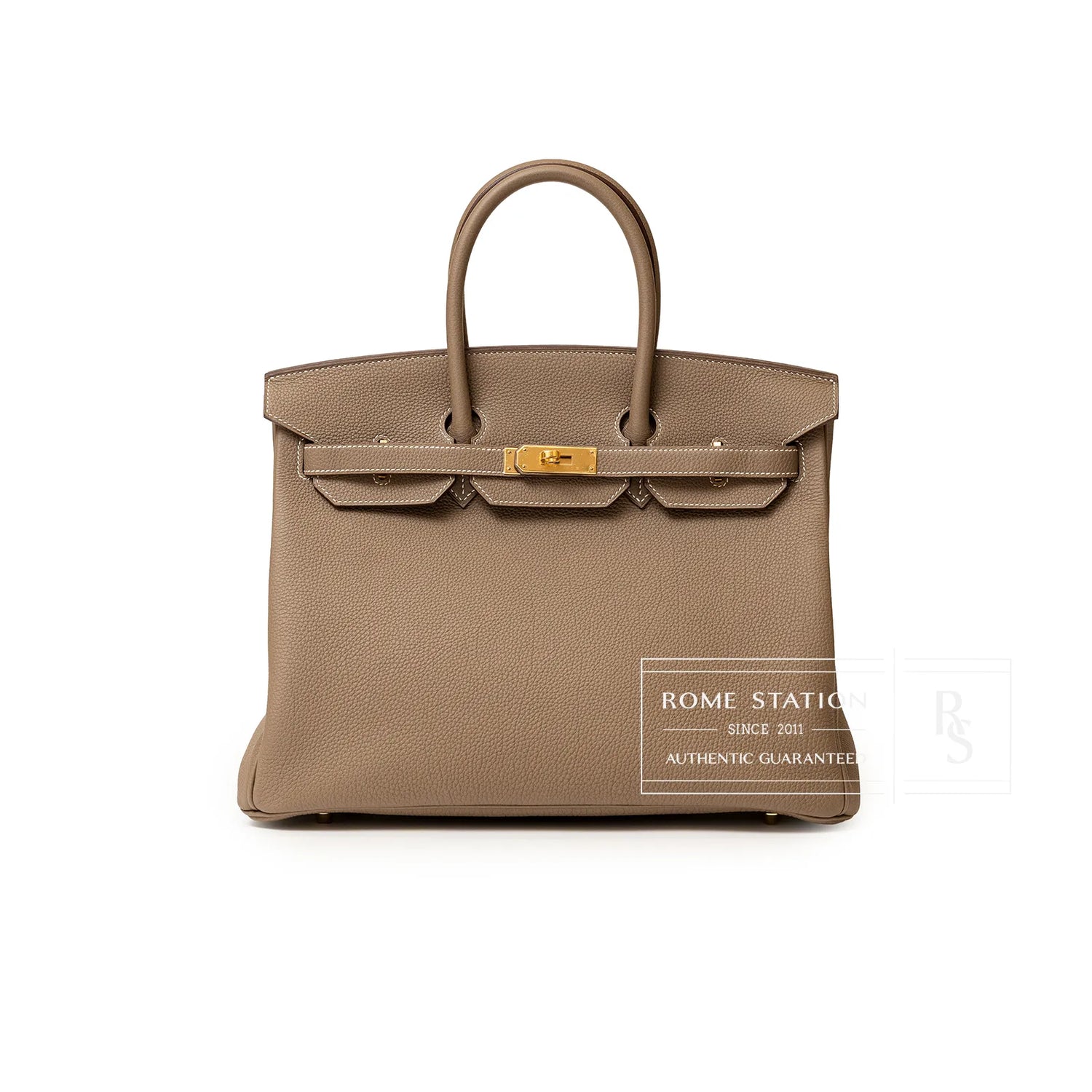 Front view of Hermès Birkin 35 Etoupe Togo leather bag with gold hardware and double handles.