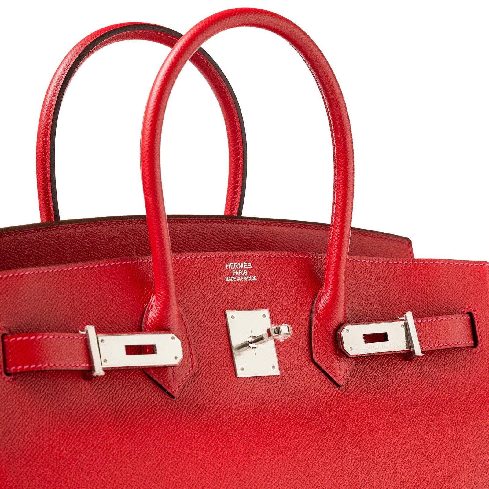 Close-up front view of Hermès Birkin 35 Rouge Casaque Epsom leather with palladium hardware details.