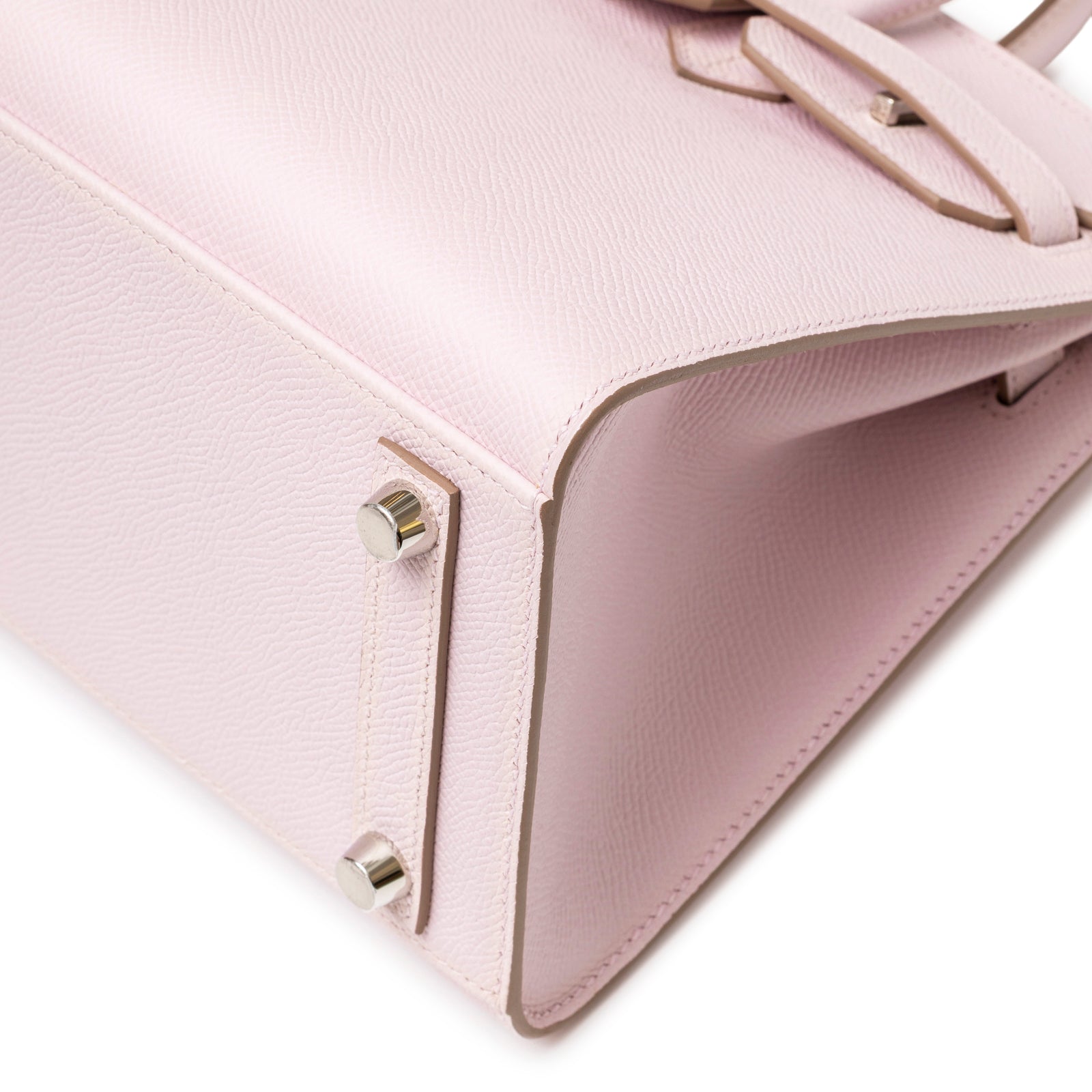 Close-up of base corner and palladium hardware feet on Hermès Birkin Sellier 25 Mauve Pale Epsom Palladium Hardware handbag